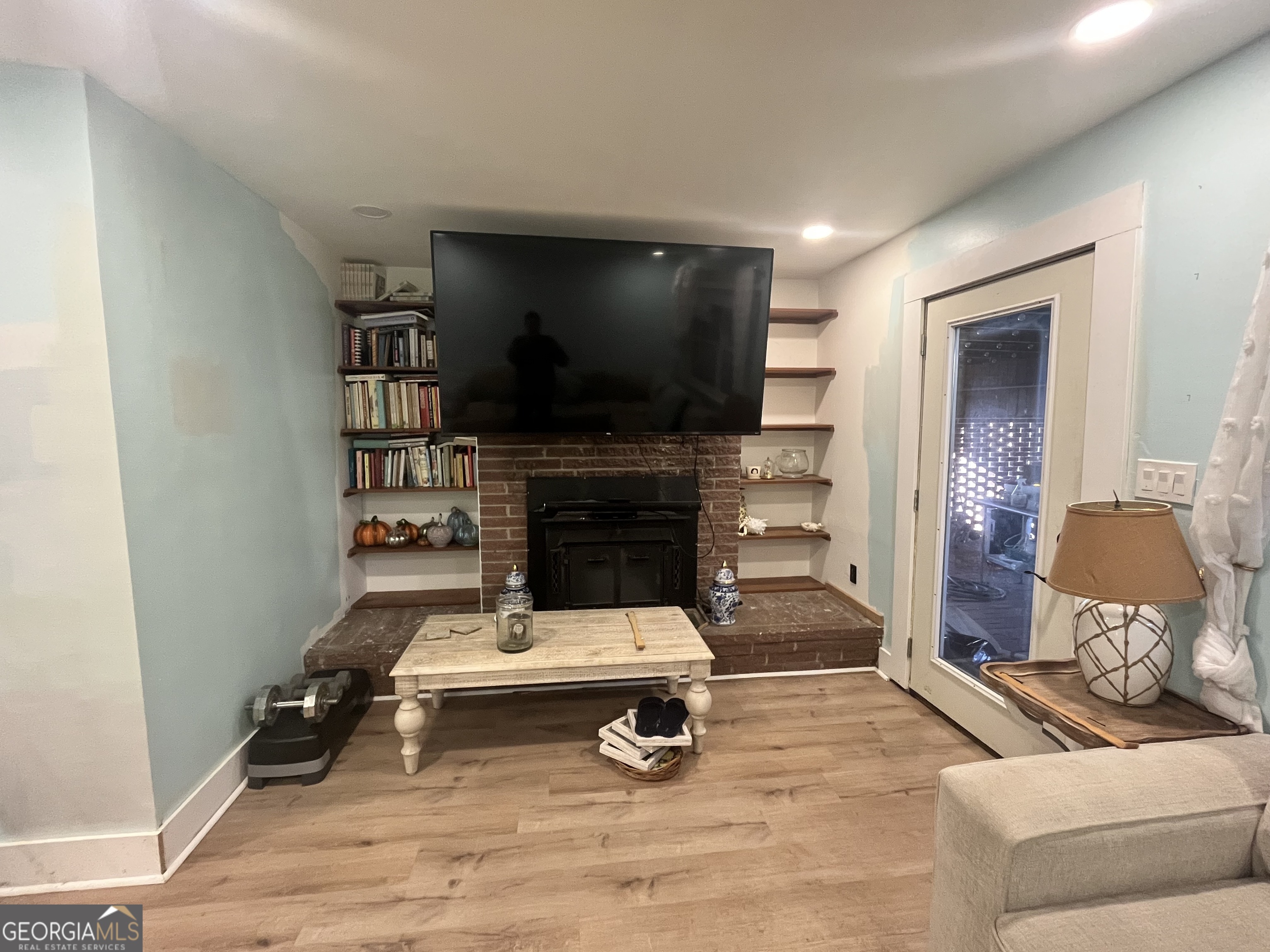 109 Schaefer Court Toccoa, GA 30577 - Photo 9 of 28 a living room with furniture and a flat screen tv