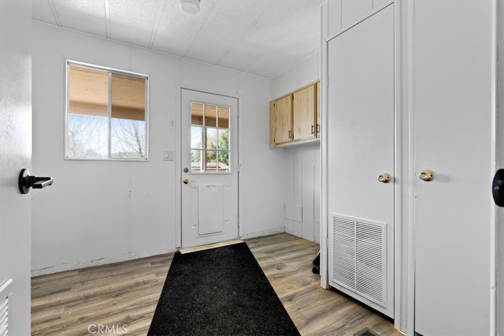 5405 Marjorie Street Weldon, CA 93283 - Photo 12 of 36 a view of a room with wooden floor and windows