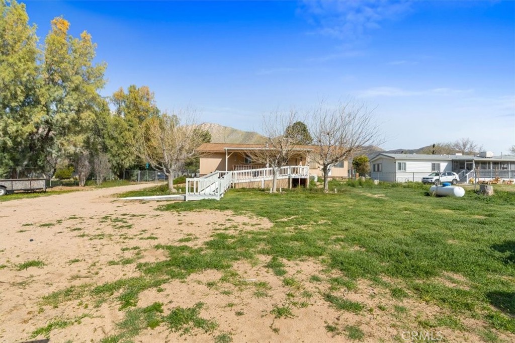 5405 Marjorie Street Weldon, CA 93283 - Photo 25 of 36 a view of a house with a big yard