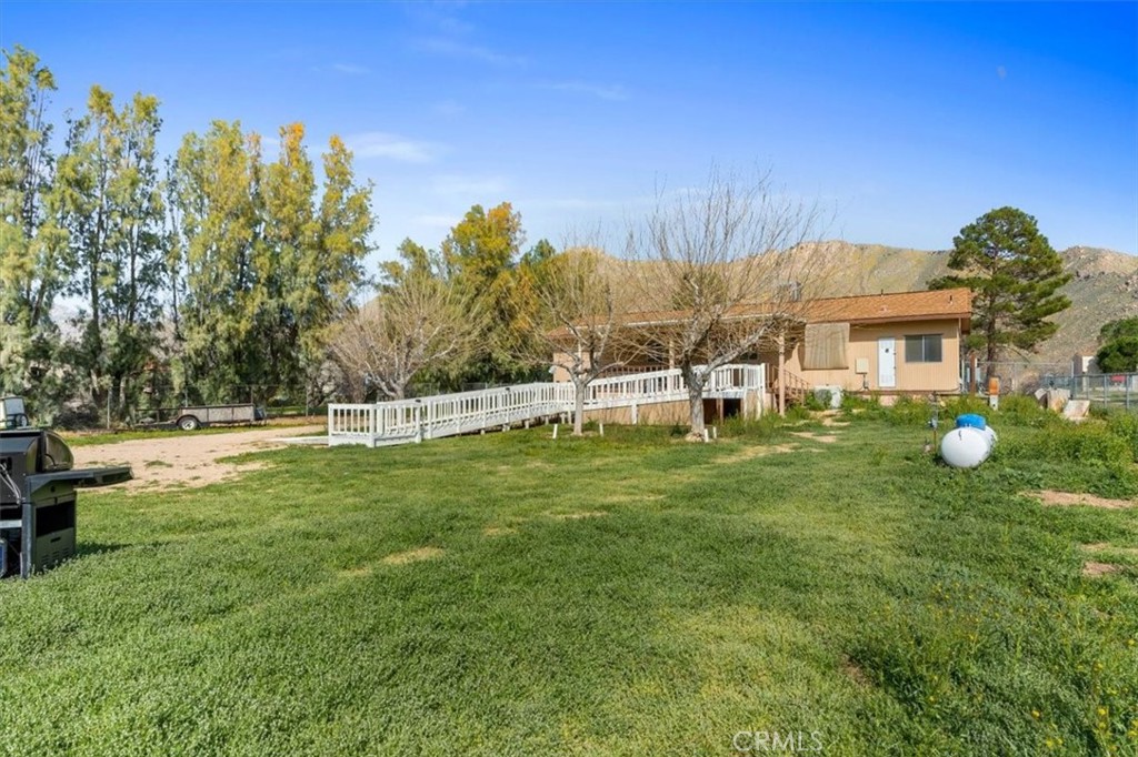 5405 Marjorie Street Weldon, CA 93283 - Photo 27 of 36 a view of a house with a backyard