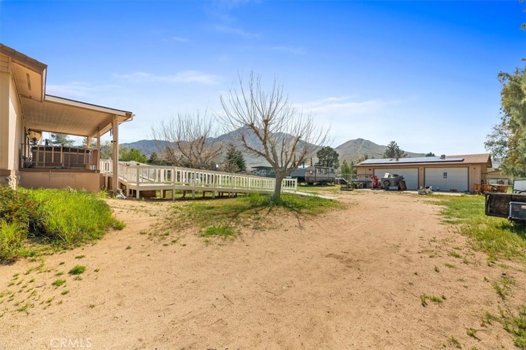 5405 Marjorie Street Weldon, CA 93283 - Photo 28 of 36 a view of a house with a yard