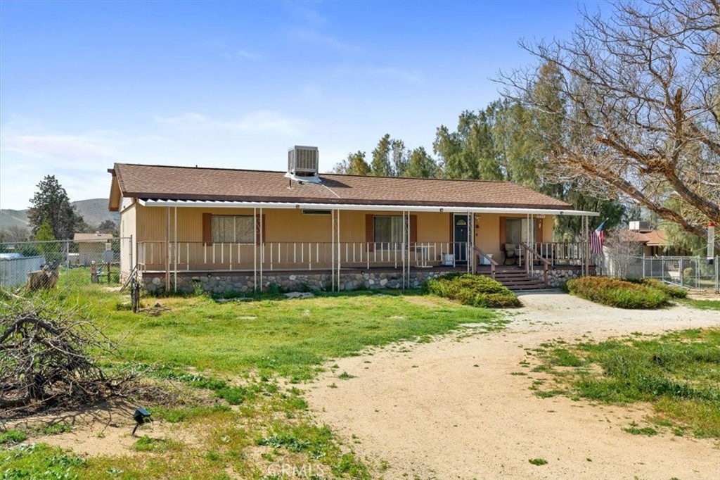 5405 Marjorie Street Weldon, CA 93283 - Photo 5 of 36 a view of a house with a yard