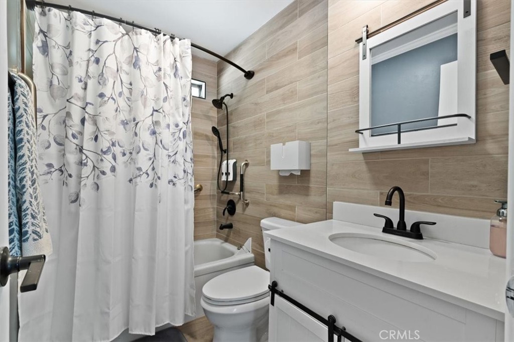 5405 Marjorie Street Weldon, CA 93283 - Photo 7 of 36 a bathroom with a sink toilet and shower