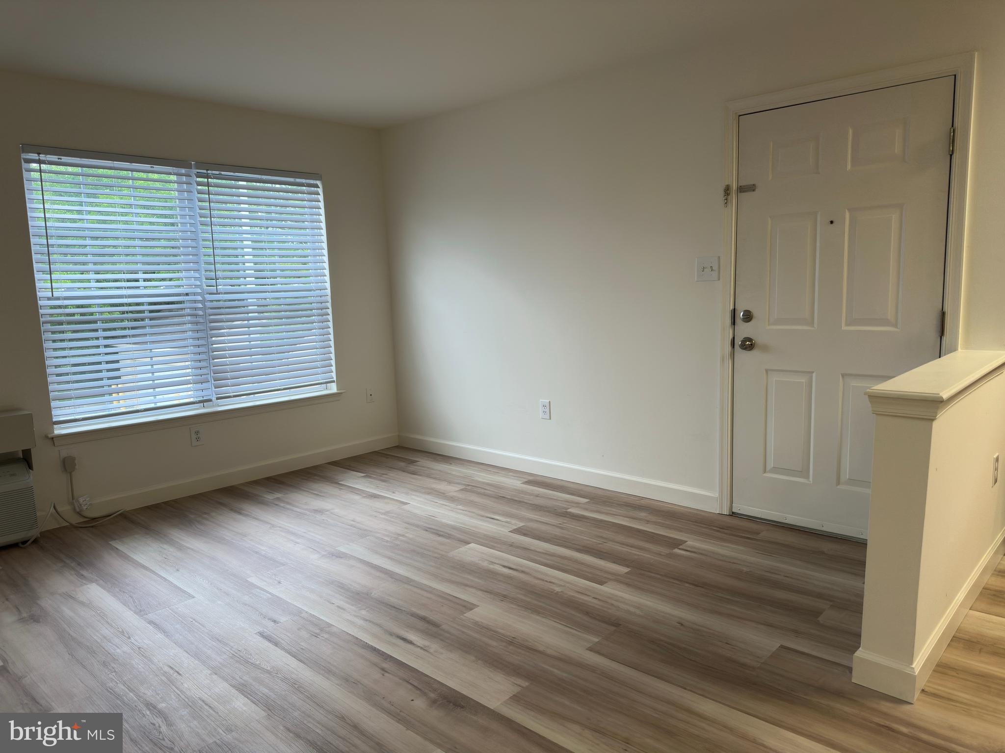 16 Sequoia Drive Berlin, NJ 08009 - Photo 14 of 16 an empty room with wooden floor and a window