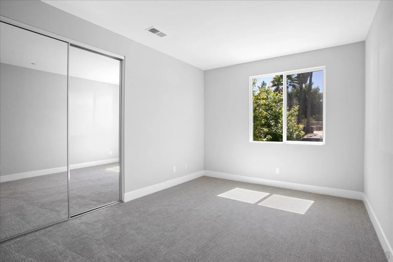 311 Brotherton Road Escondido, CA 92025 - Photo 17 of 33 an empty room with a window
