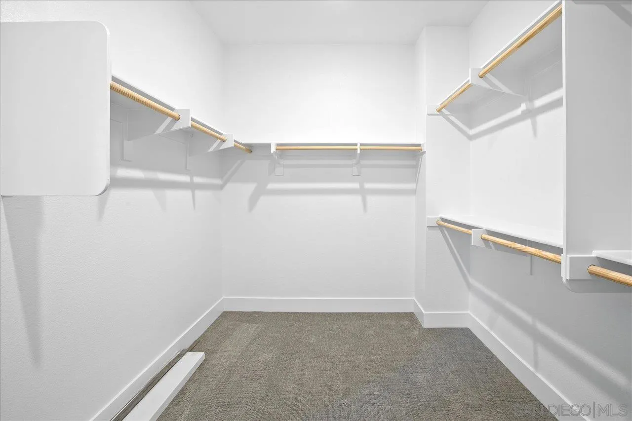 311 Brotherton Road Escondido, CA 92025 - Photo 24 of 33 a view of an empty walk in closet