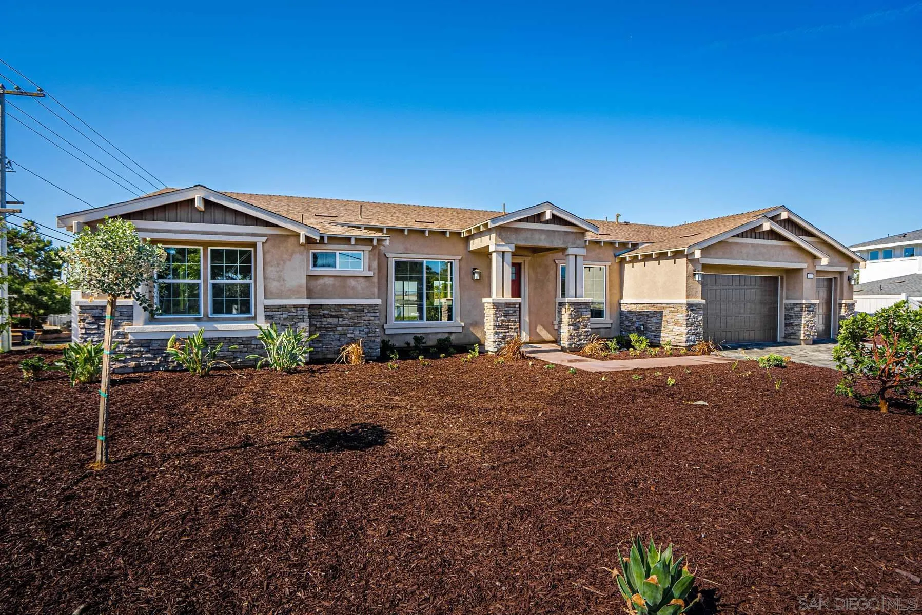 311 Brotherton Road Escondido, CA 92025 - Photo 30 of 33 a front view of a house with a yard