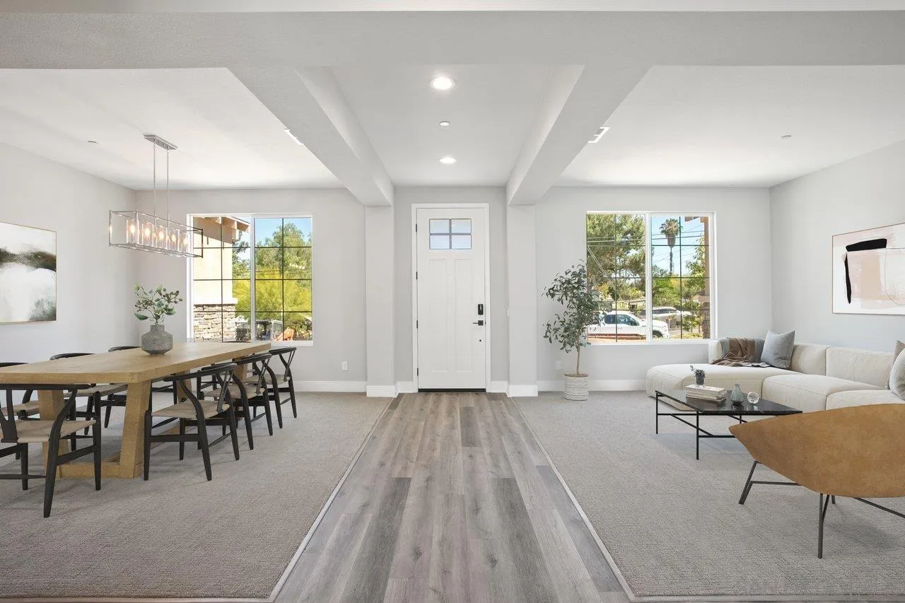 311 Brotherton Road Escondido, CA 92025 - Photo 3 of 33 a view of a dining room with furniture window and wooden floor
