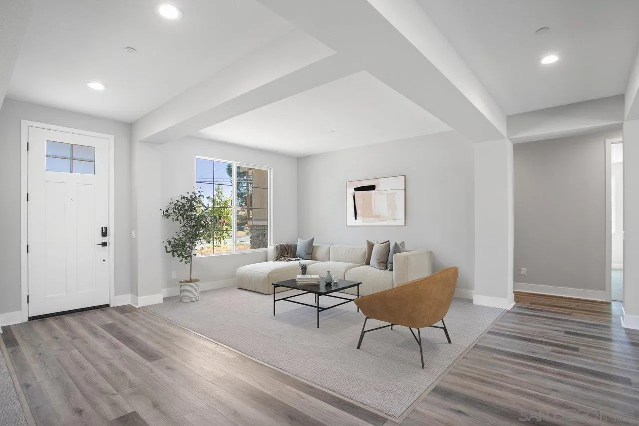 311 Brotherton Road Escondido, CA 92025 - Photo 5 of 33 a living room with furniture and a wooden floor