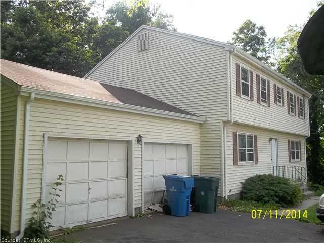 124 Garden Grove Road Manchester, CT 06040 - Photo 1 of 1 a front view of a house