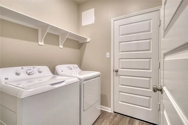 a utility room with dryer and washer
