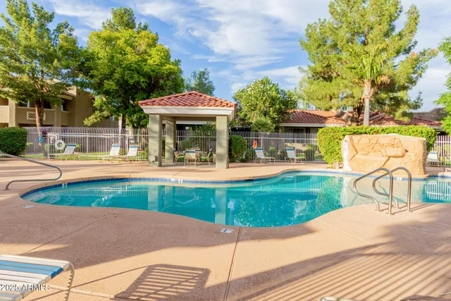 a view of a house with a swimming pool
