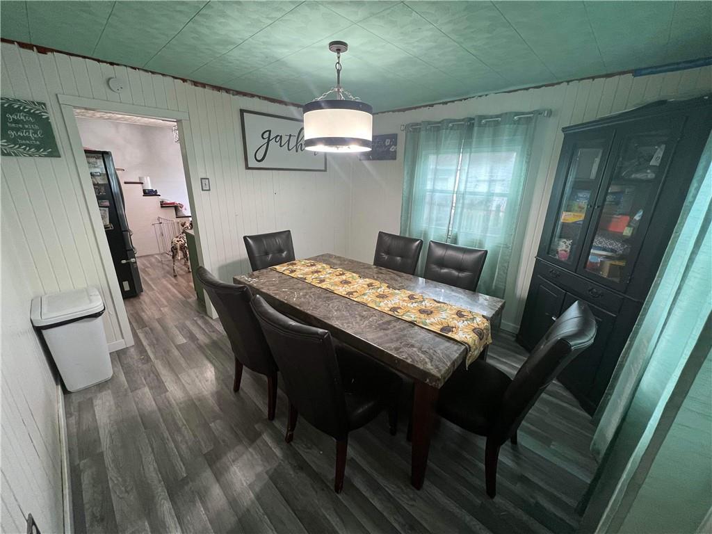 585 Lone Pine Road Washington, PA 15301 - Photo 12 of 22 a view of a dining room with furniture and wooden floor