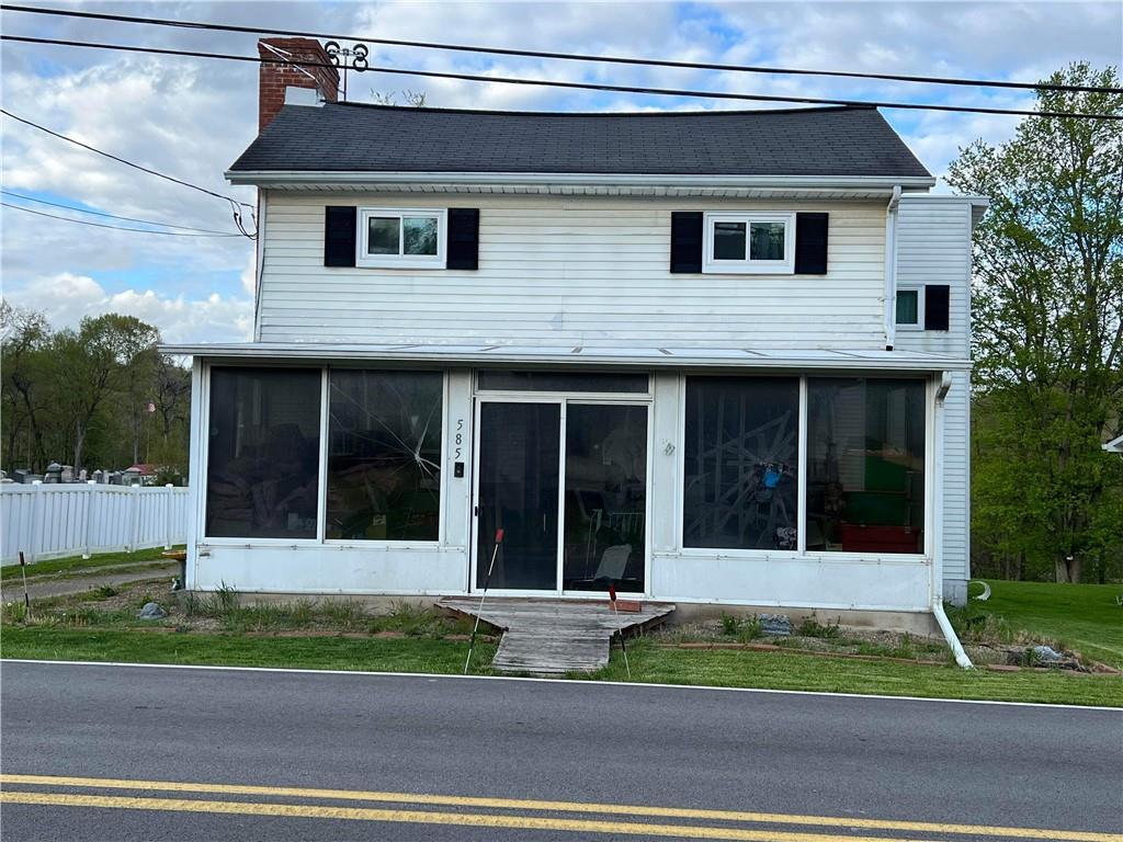 585 Lone Pine Road Washington, PA 15301 - Photo 2 of 22 a view of a house with a yard plants and large tree