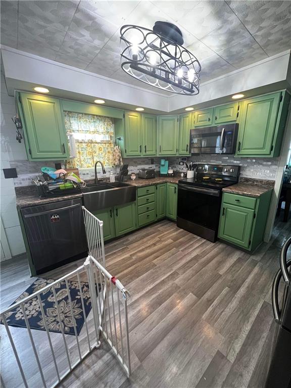 585 Lone Pine Road Washington, PA 15301 - Photo 6 of 22 a kitchen with stainless steel appliances kitchen island granite countertop a sink and cabinets
