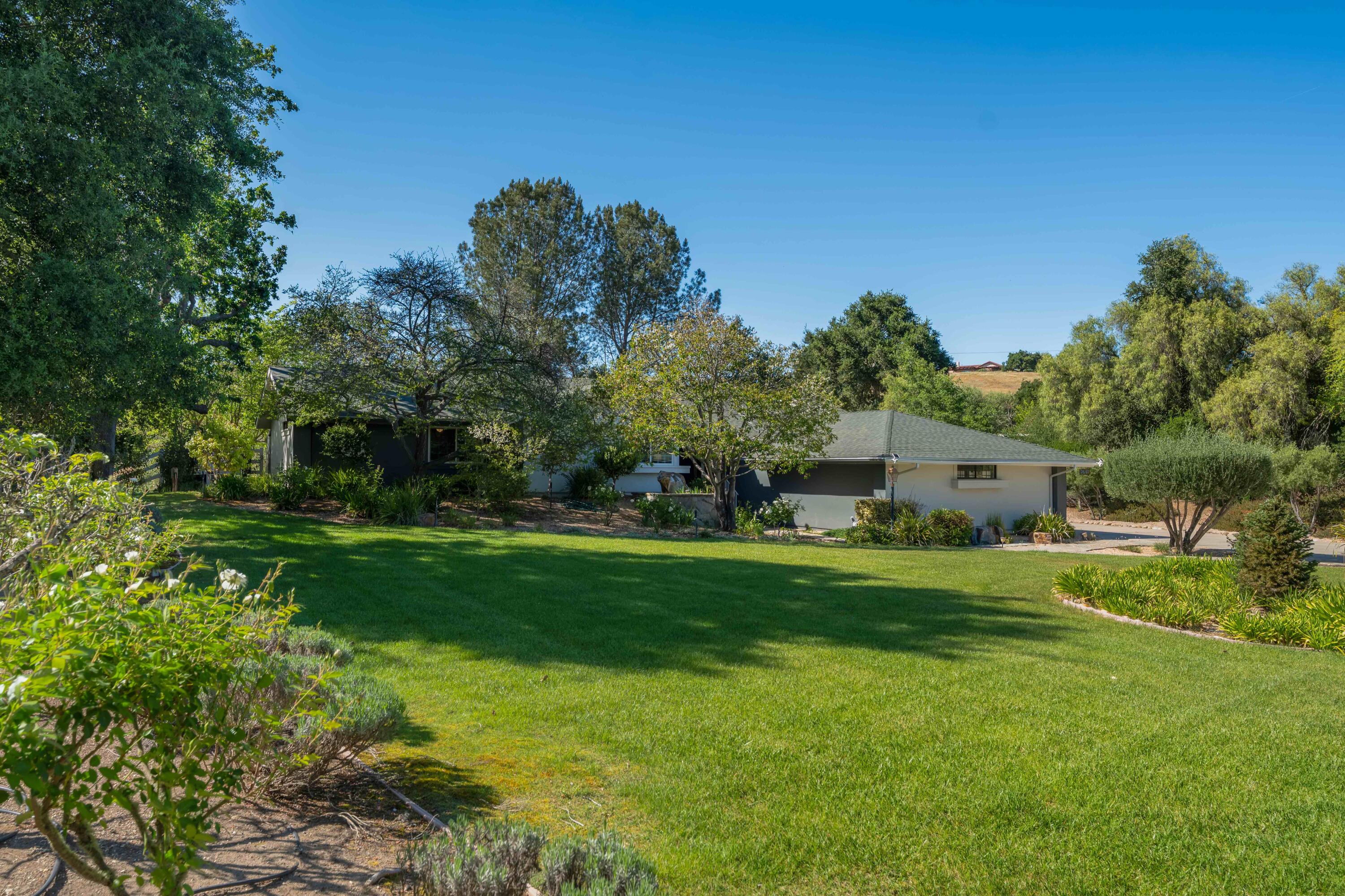 2667 Quail Valley Road Solvang, CA 93463 - Photo 17 of 62 a front view of a house with a yard