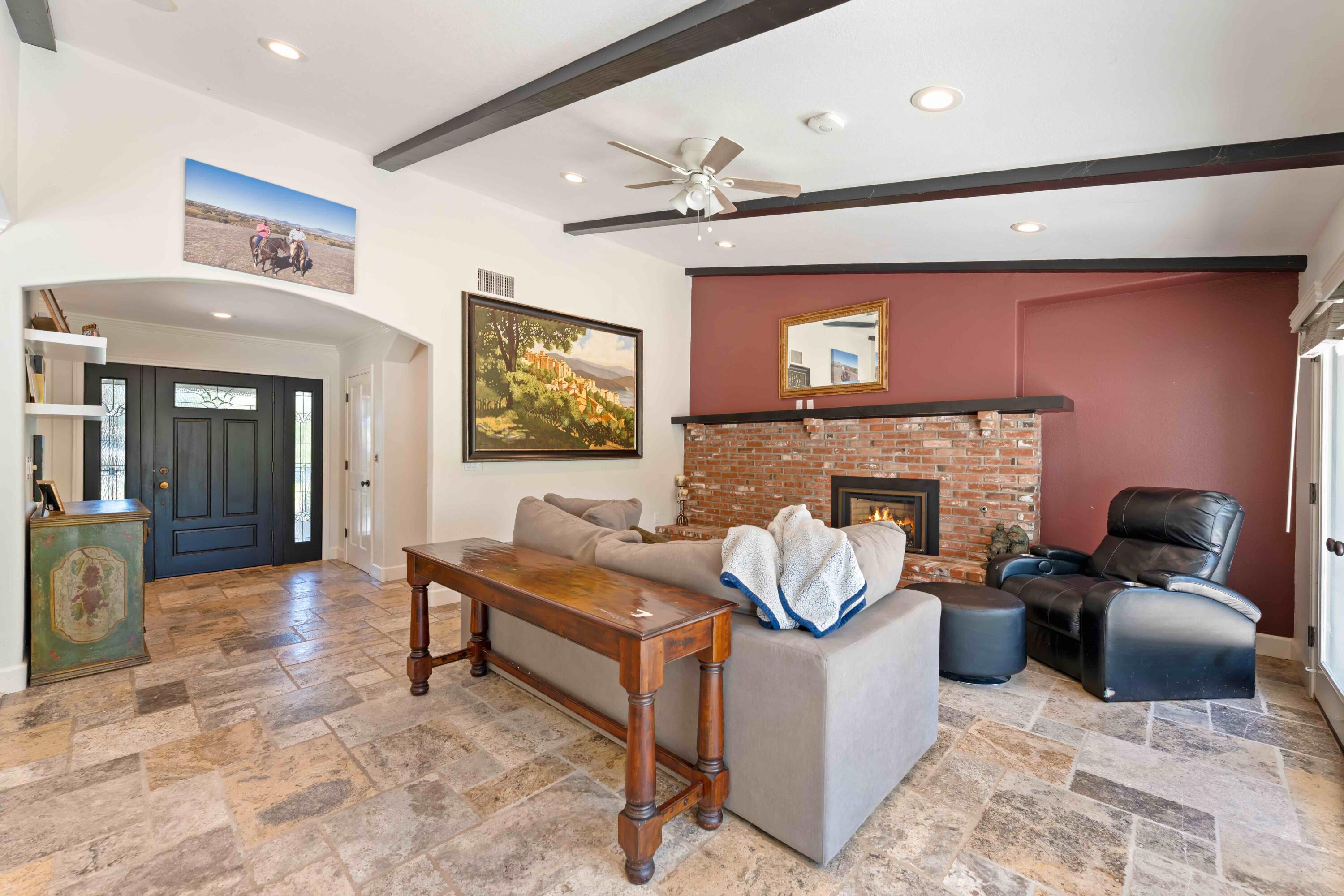 2667 Quail Valley Road Solvang, CA 93463 - Photo 20 of 62 a living room with furniture and a fireplace