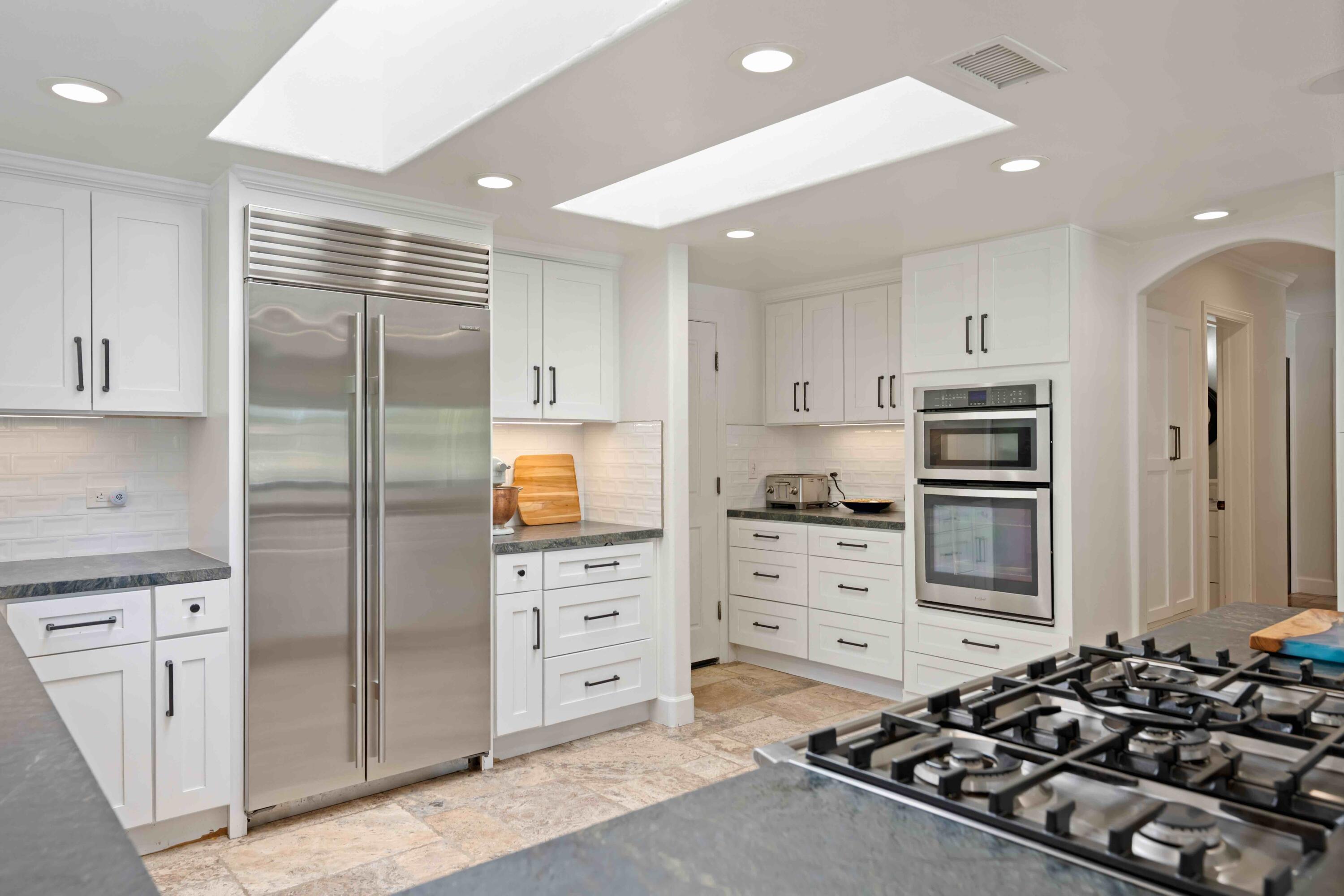 2667 Quail Valley Road Solvang, CA 93463 - Photo 26 of 62 a kitchen with stainless steel appliances a stove and a refrigerator