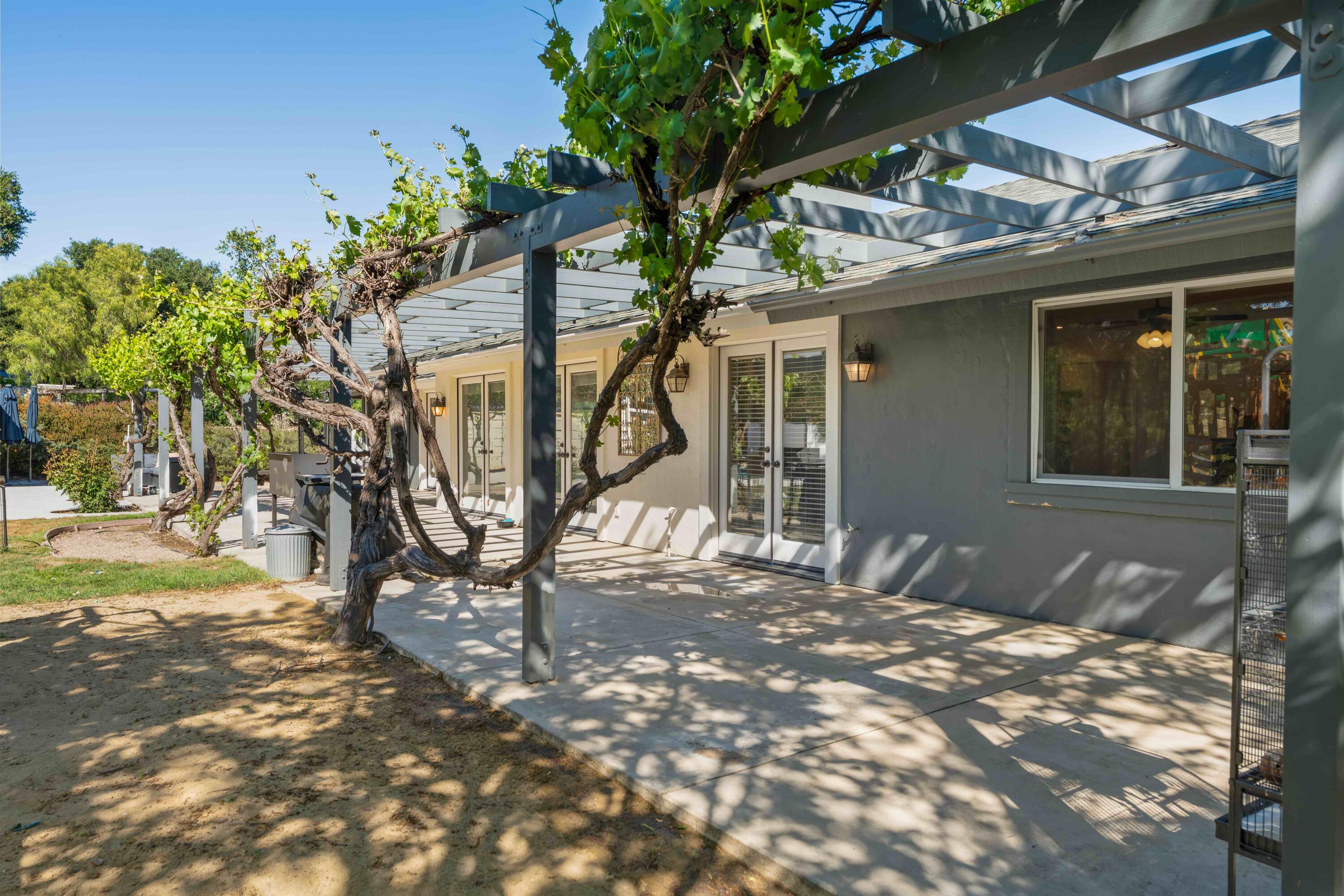 2667 Quail Valley Road Solvang, CA 93463 - Photo 31 of 62 a view of a house with a tree