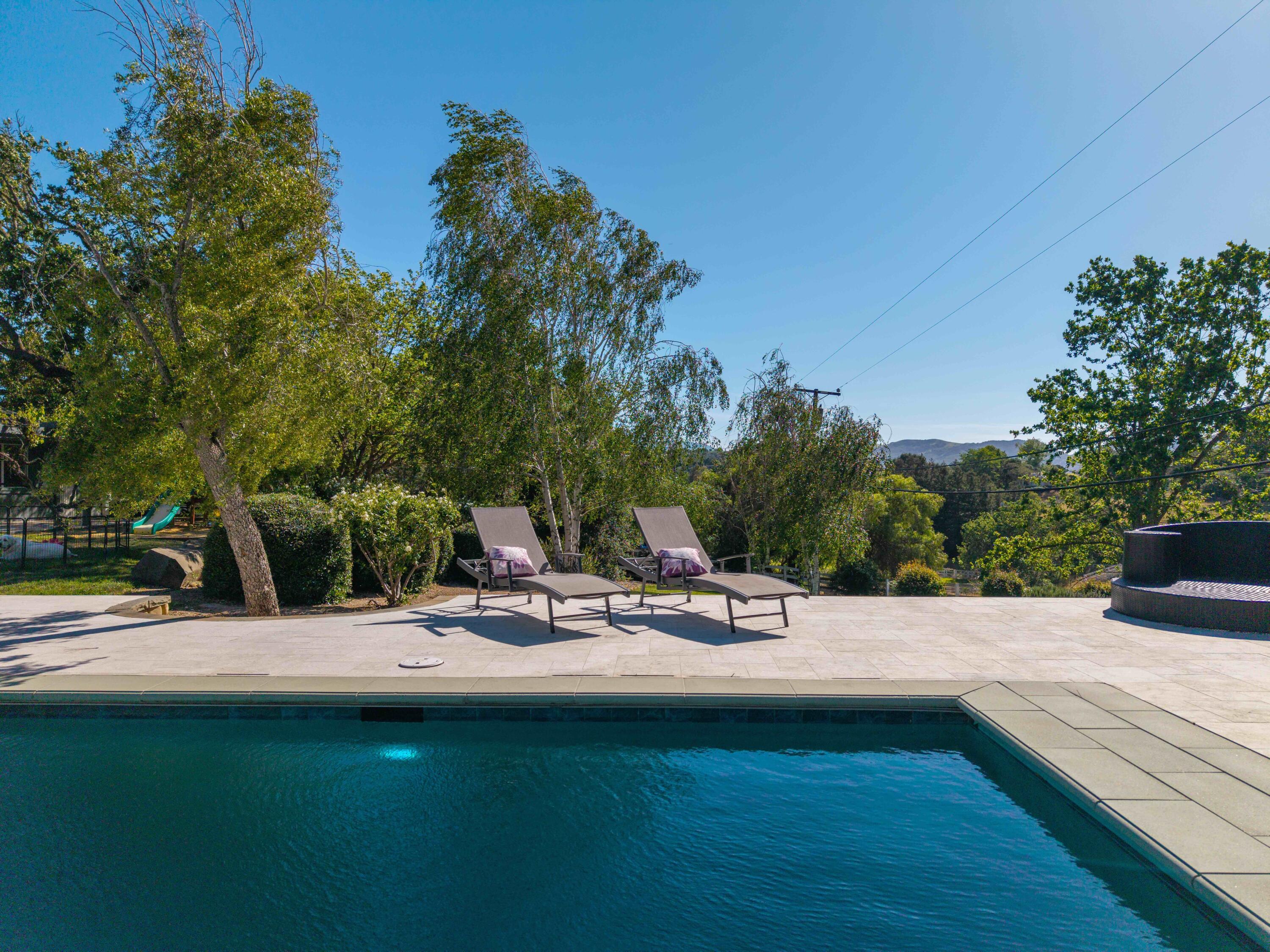 2667 Quail Valley Road Solvang, CA 93463 - Photo 34 of 62 a view of swimming pool with chairs