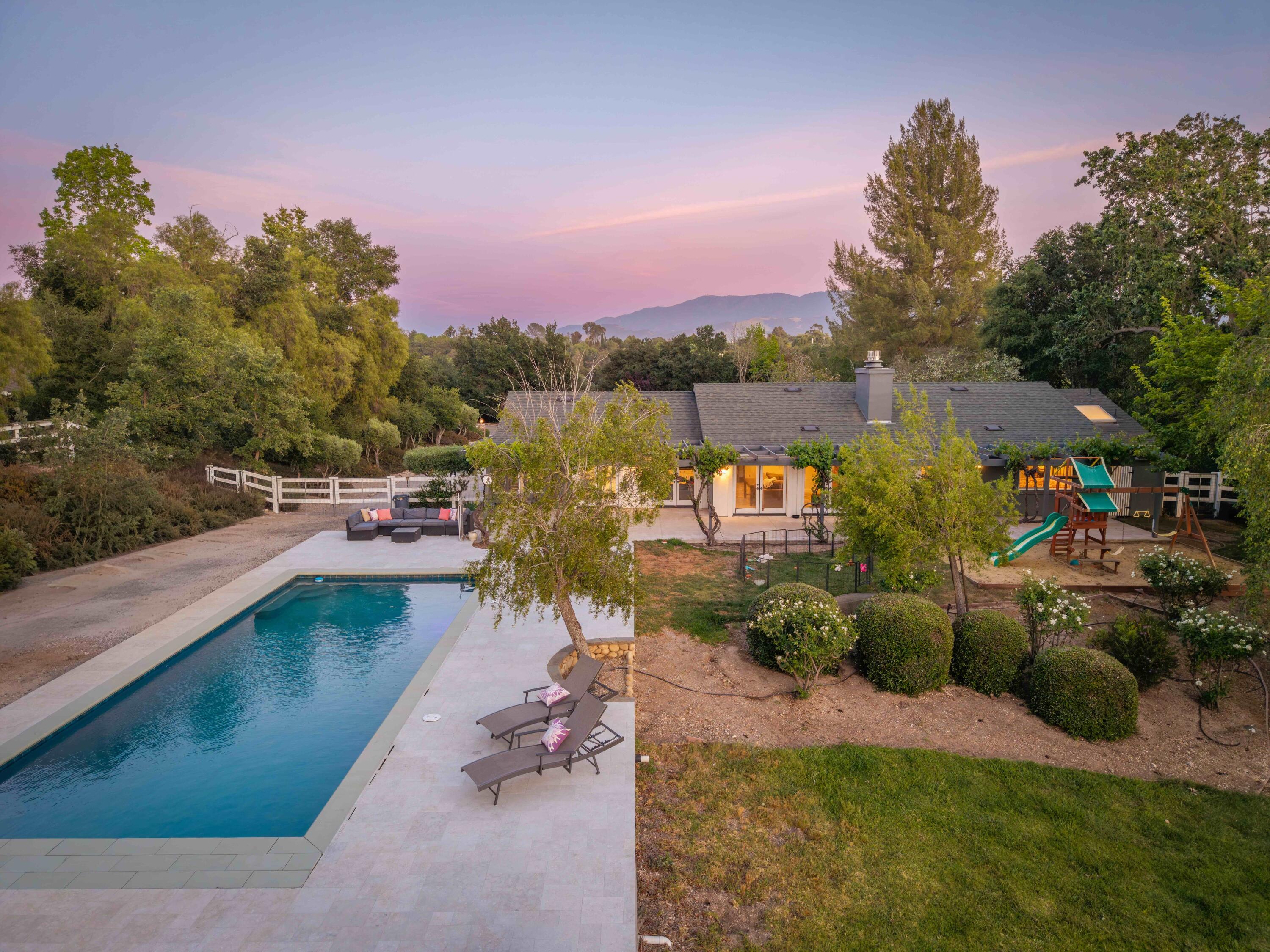 2667 Quail Valley Road Solvang, CA 93463 - Photo 36 of 62 a view of a lake with a houses