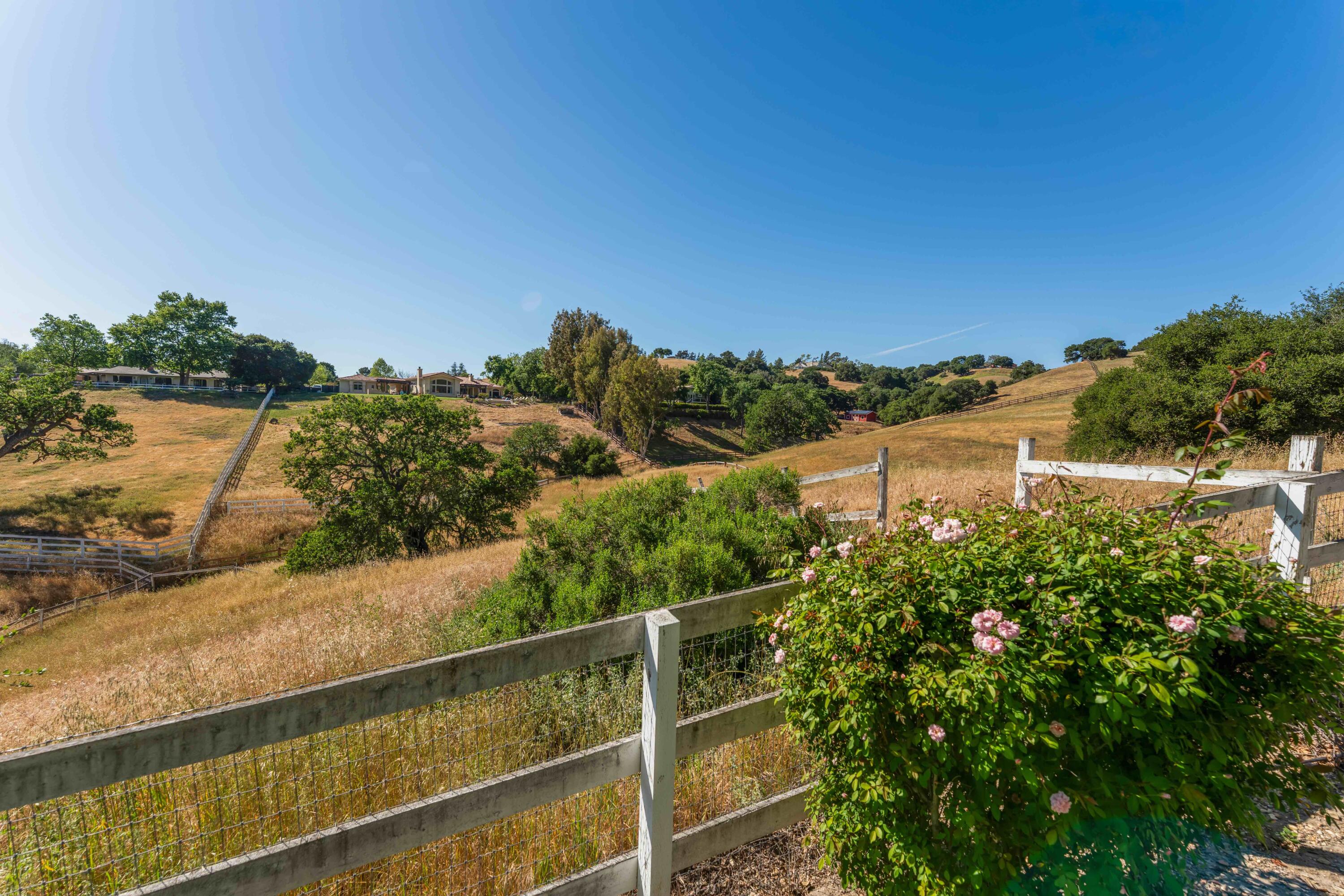 2667 Quail Valley Road Solvang, CA 93463 - Photo 48 of 62 a view of a lake with a mountain in the background