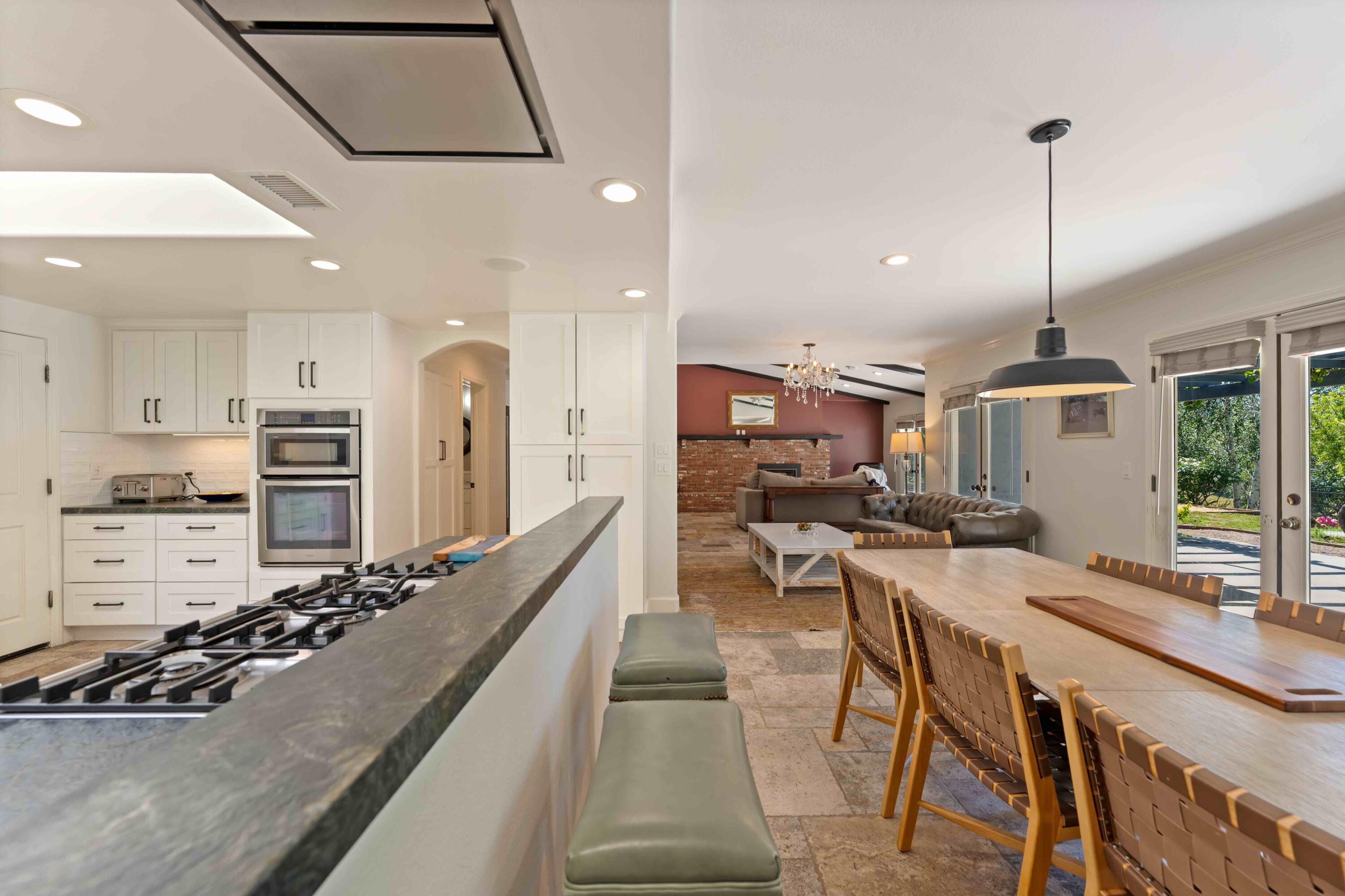 2667 Quail Valley Road Solvang, CA 93463 - Photo 5 of 62 a kitchen with stainless steel appliances kitchen island granite countertop a sink and cabinets