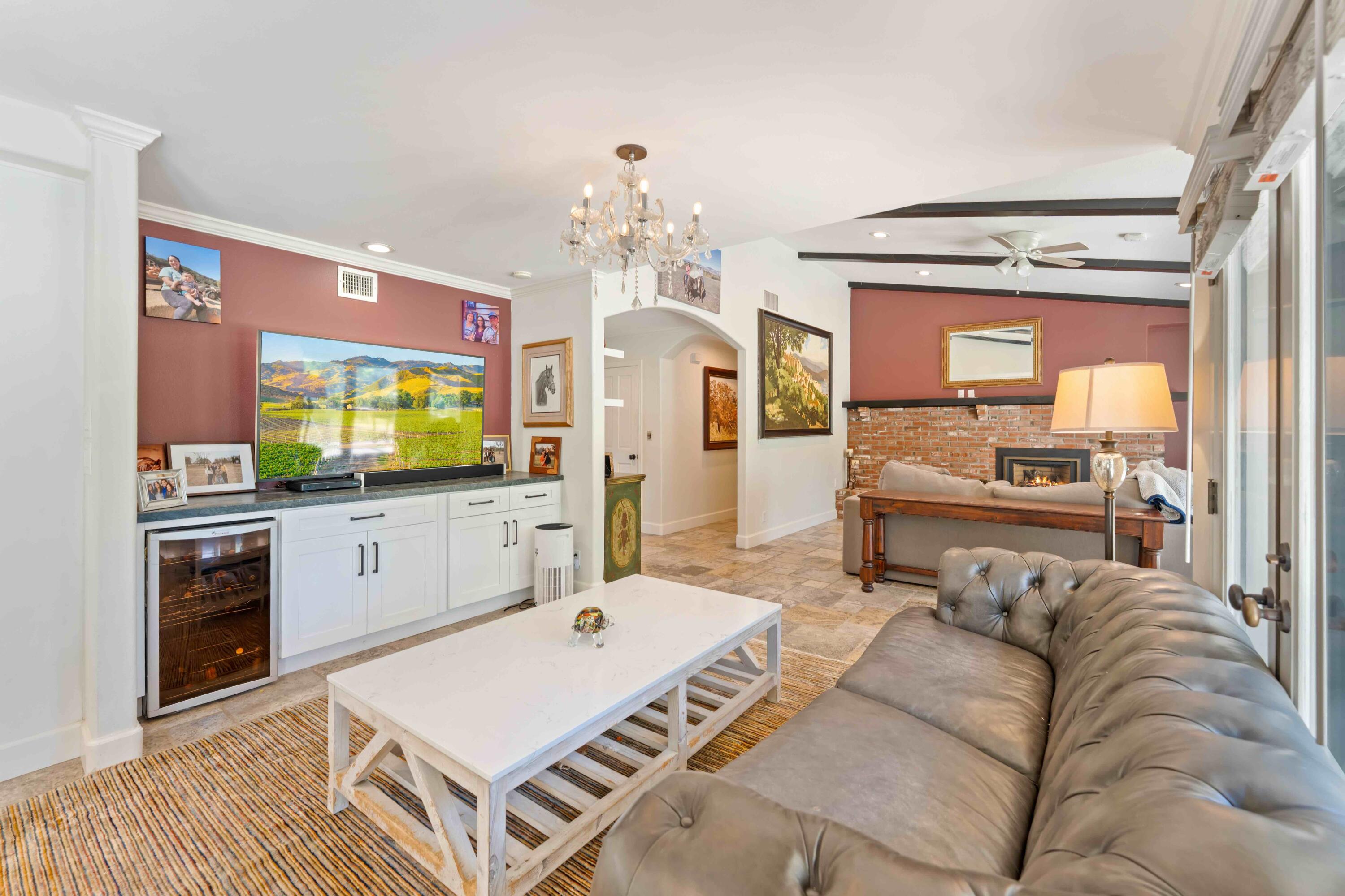2667 Quail Valley Road Solvang, CA 93463 - Photo 7 of 62 a living room with furniture and a flat screen tv