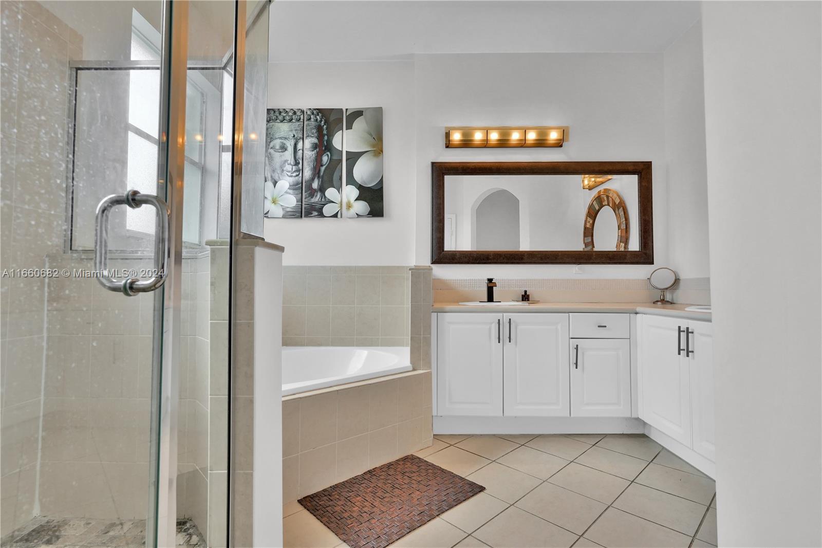 12922 Southwest 135th Street Miami, FL 33186 - Photo 29 of 62 a view of bathroom with mirror and window