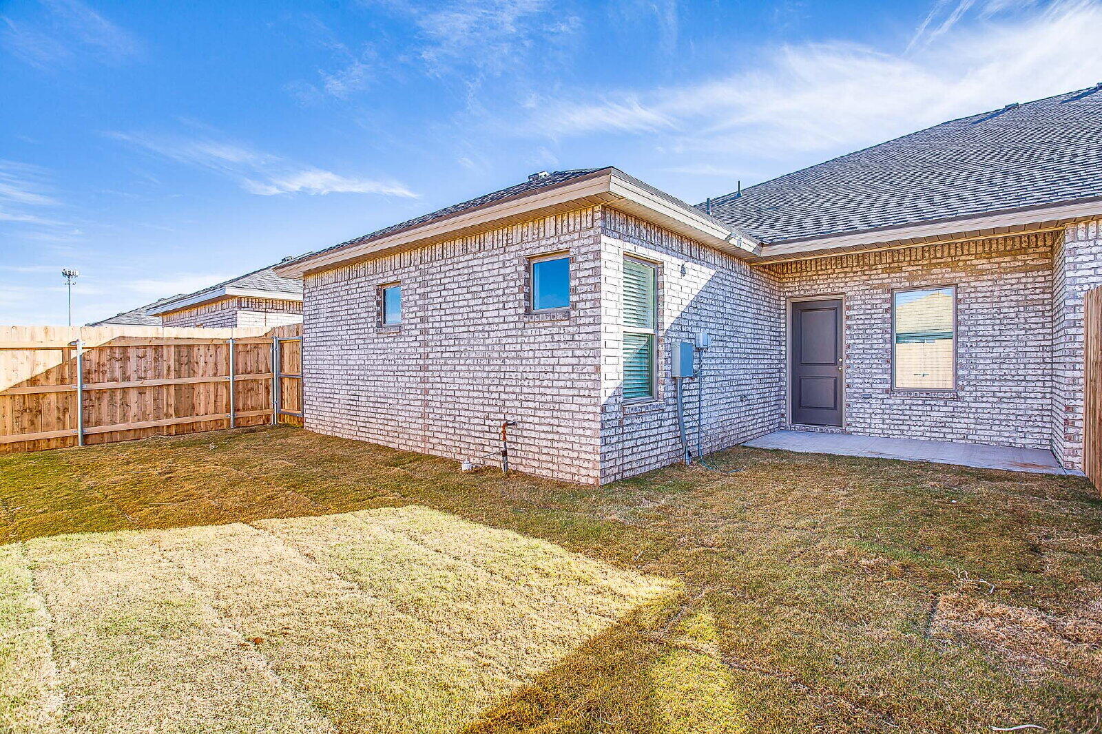 5520 121st Street, Unit B Lubbock, TX 79424 - Photo 17 of 17 a view of backyard of house