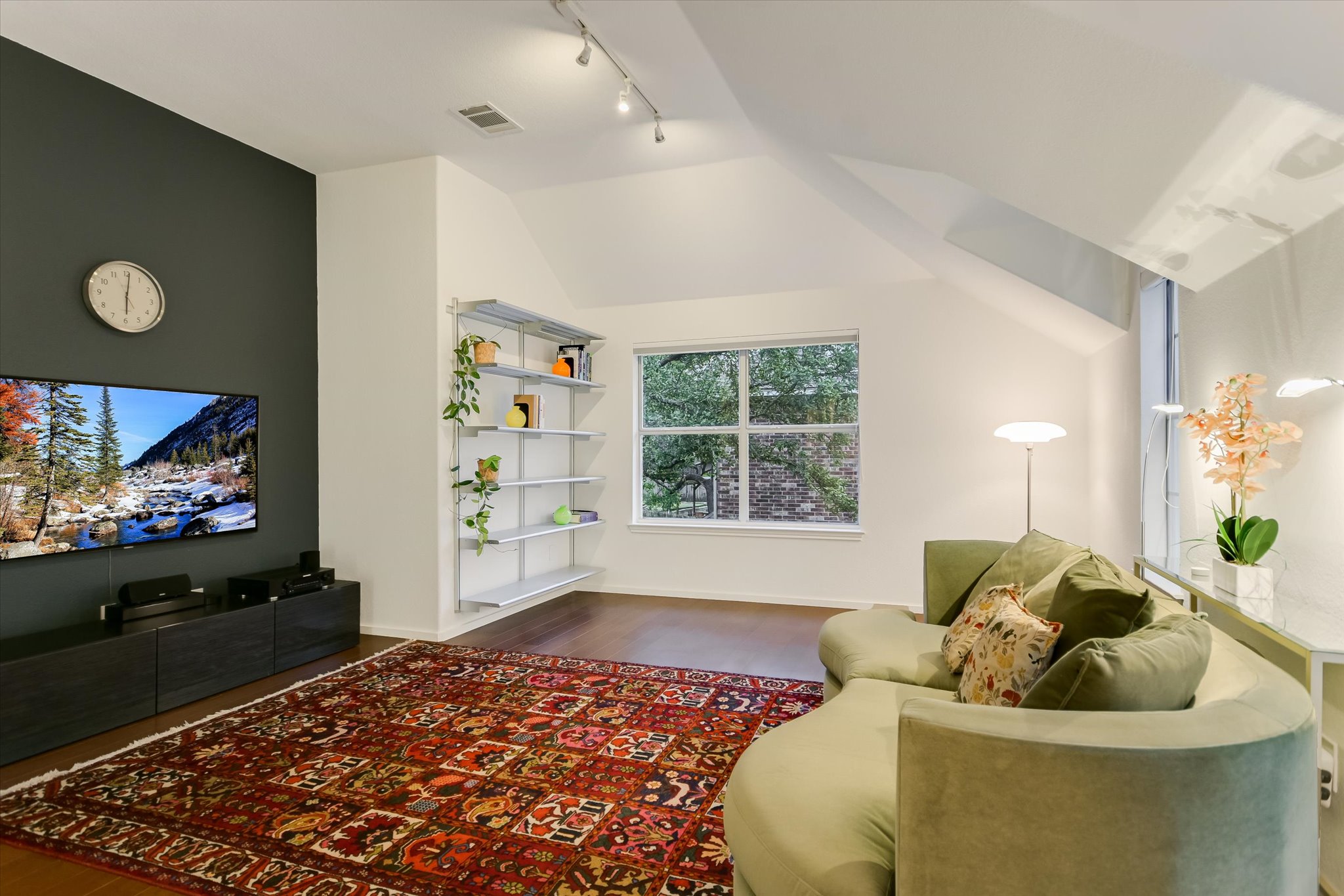 5908 Taylor Draper Cove Austin, TX 78759 - Photo 12 of 40 a living room with furniture and a flat screen tv