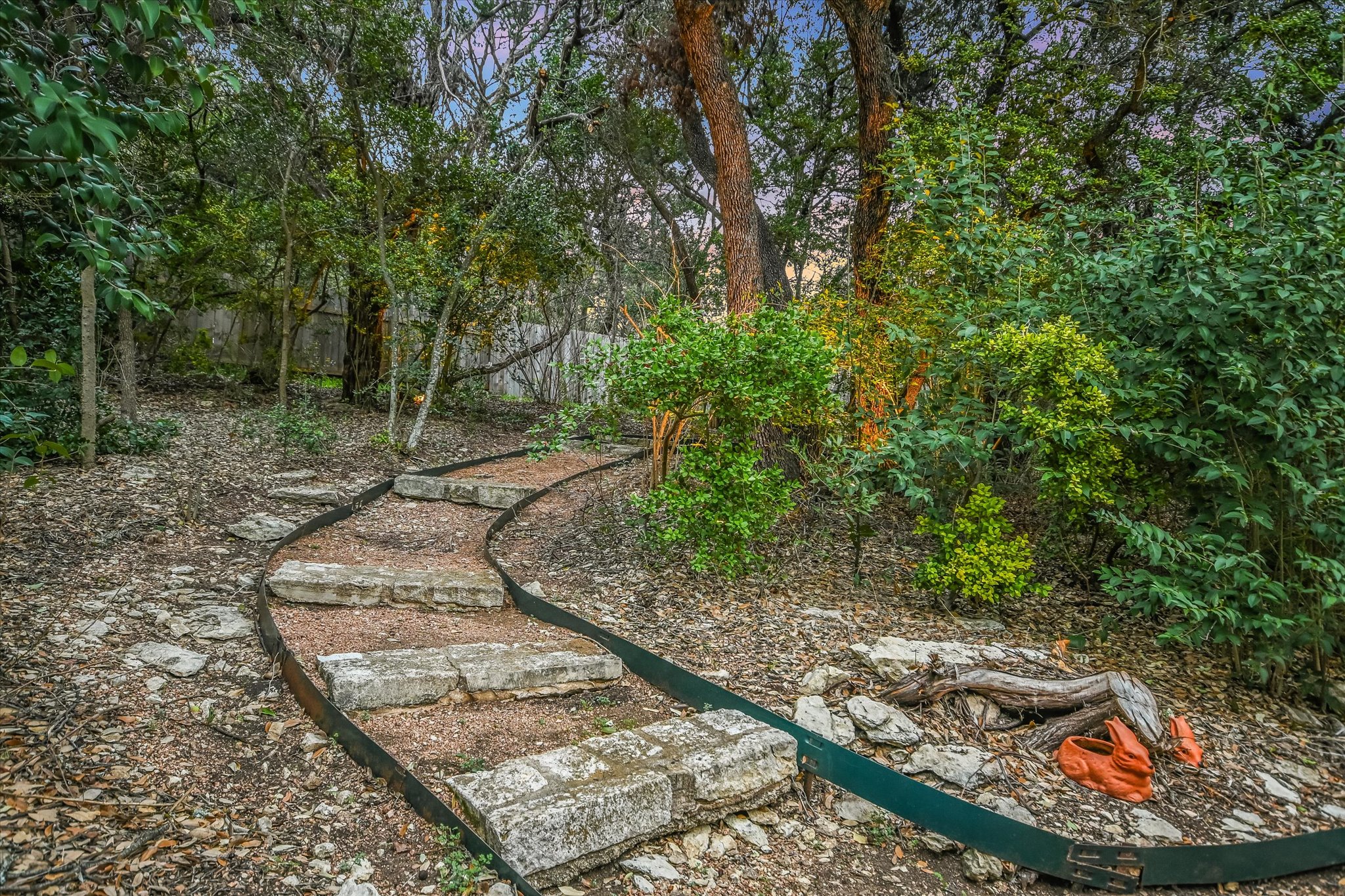 5908 Taylor Draper Cove Austin, TX 78759 - Photo 29 of 40 a view of a backyard with green space