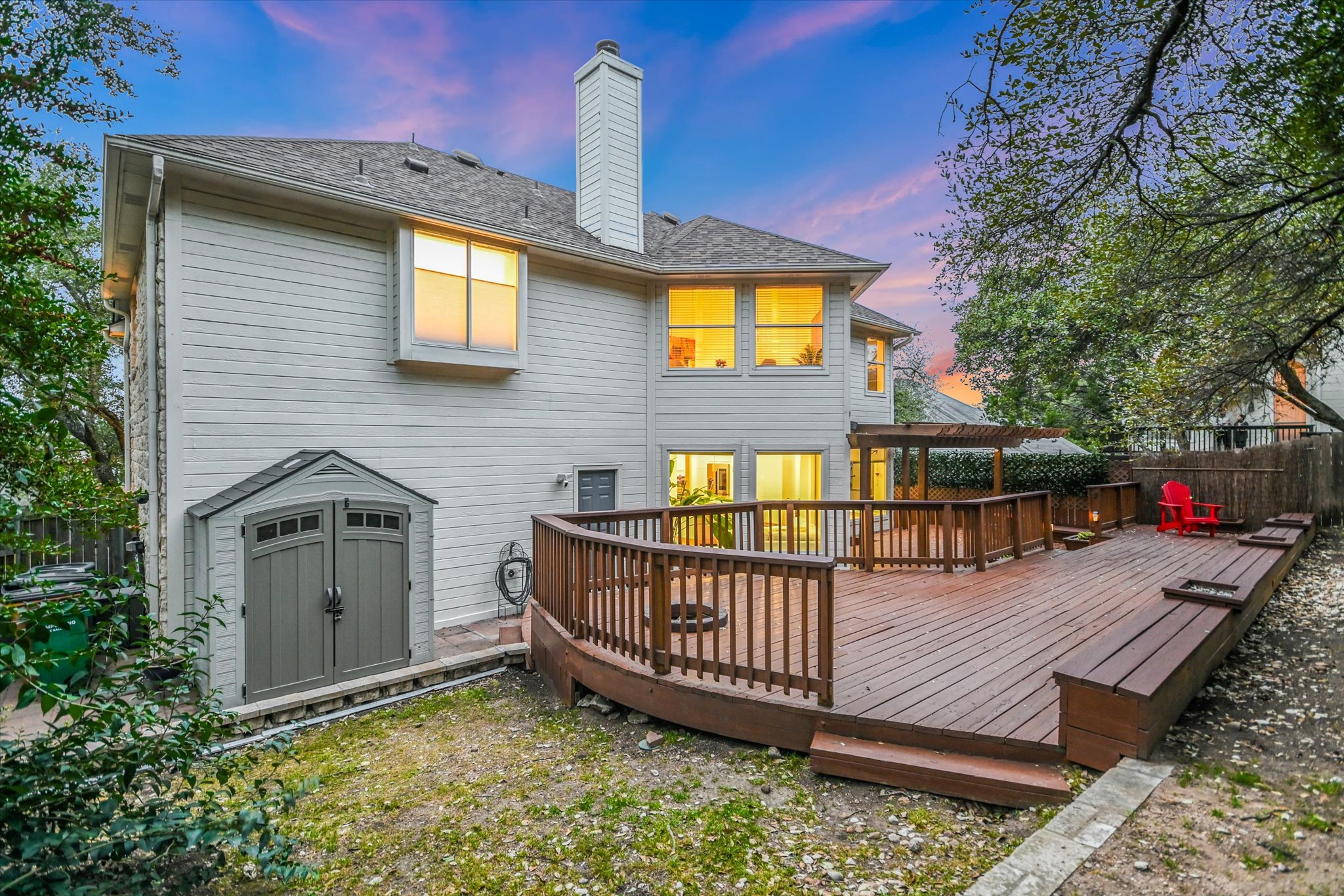 5908 Taylor Draper Cove Austin, TX 78759 - Photo 30 of 40 a view of a house with wooden fence and a porch