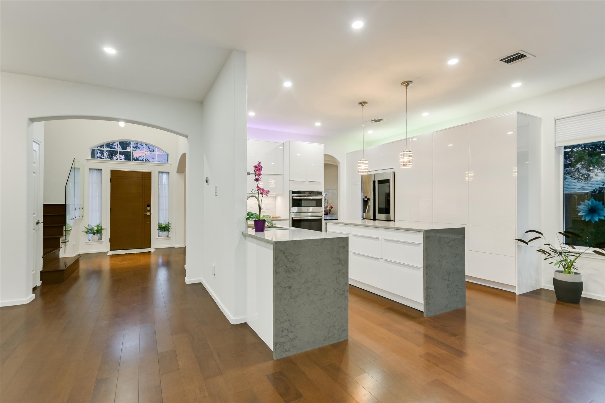 5908 Taylor Draper Cove Austin, TX 78759 - Photo 7 of 40 a view of kitchen with cabinets and wooden floor