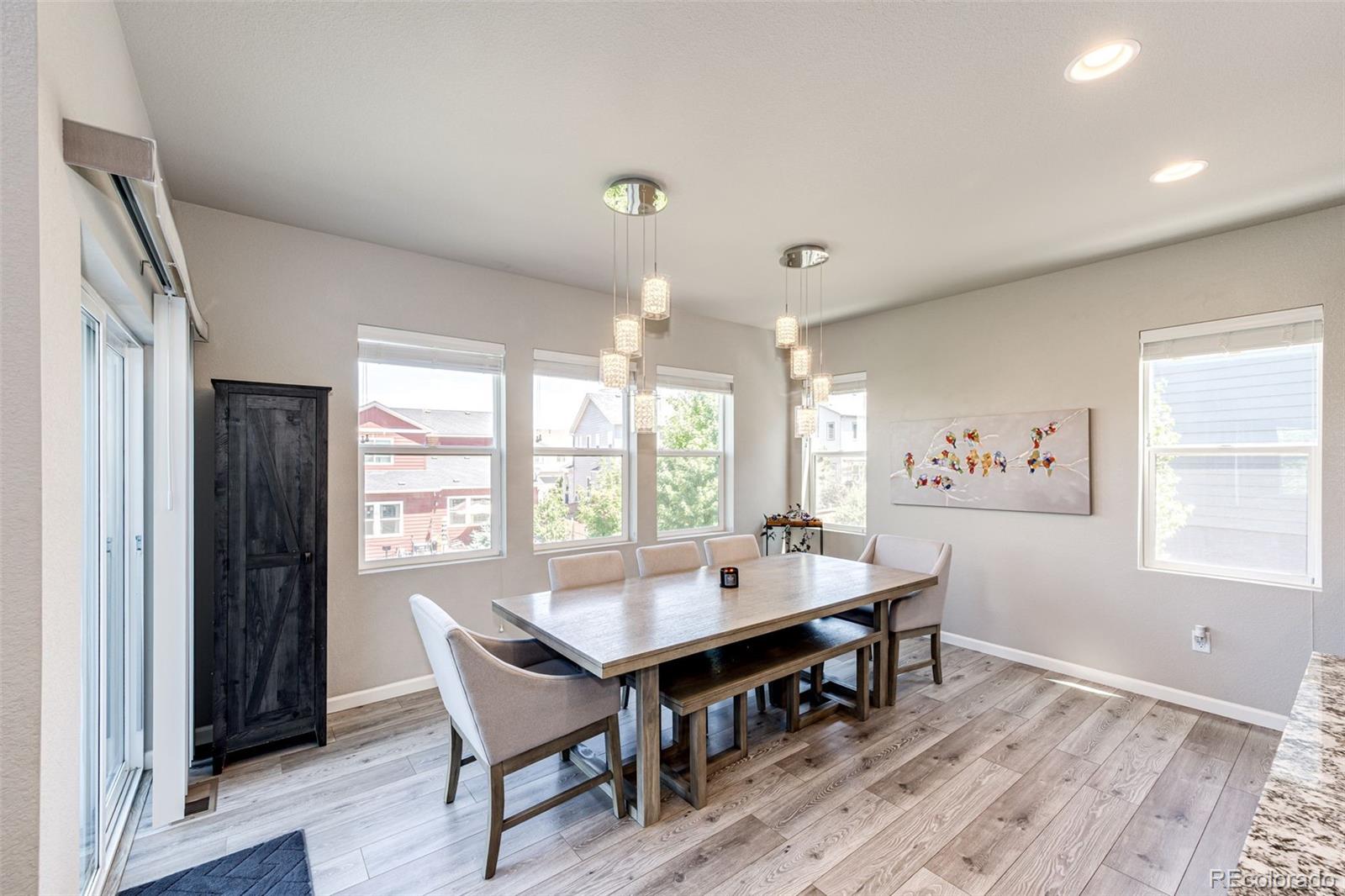 5086 Basalt Ridge Circle Castle Rock, CO 80108 - Photo 15 of 46 a view of a dining room with furniture window and outside view