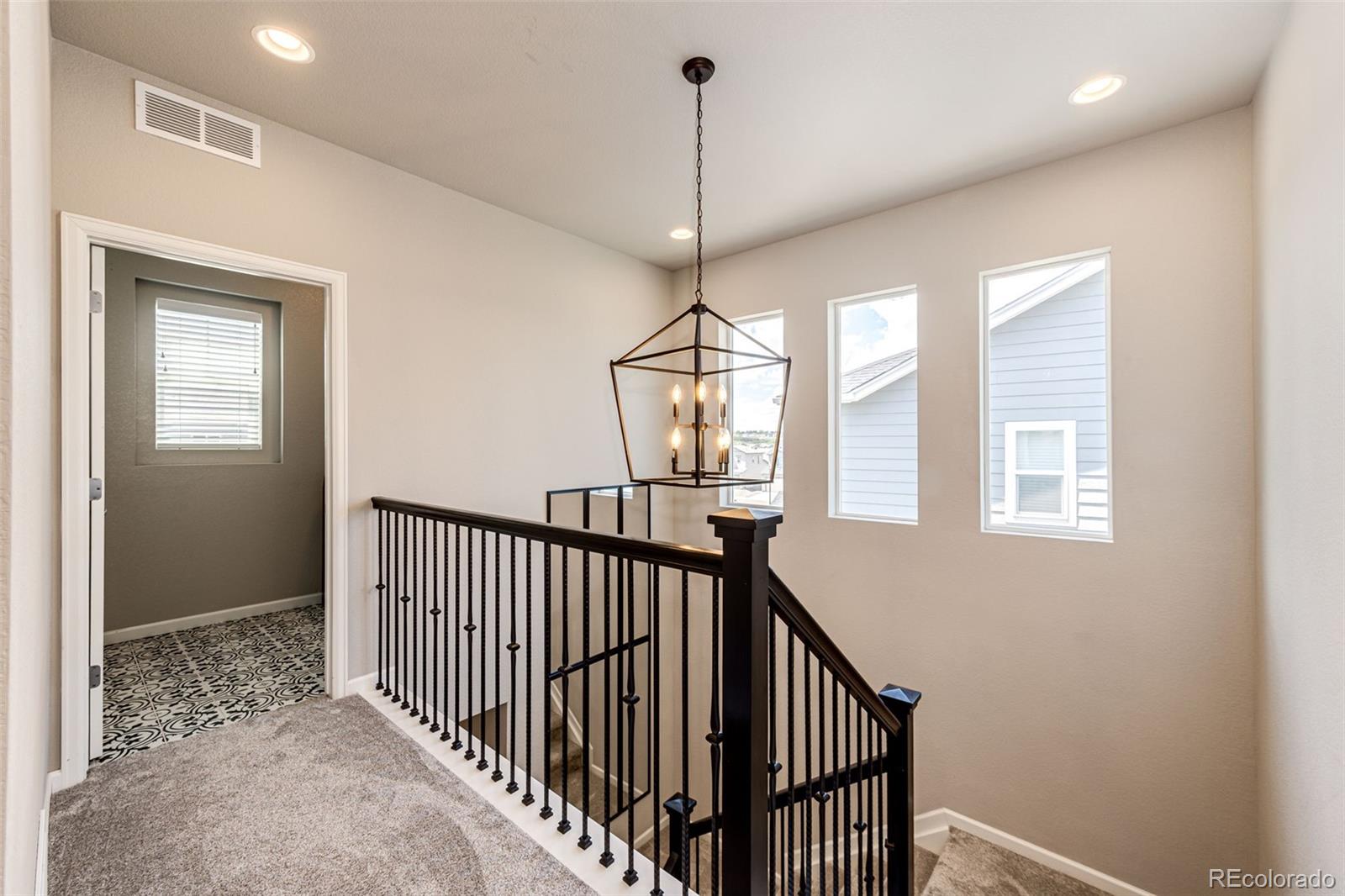 5086 Basalt Ridge Circle Castle Rock, CO 80108 - Photo 17 of 46 a view of hallway with windows