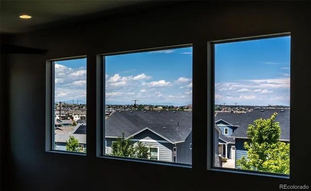 a view of swimming pool from a window