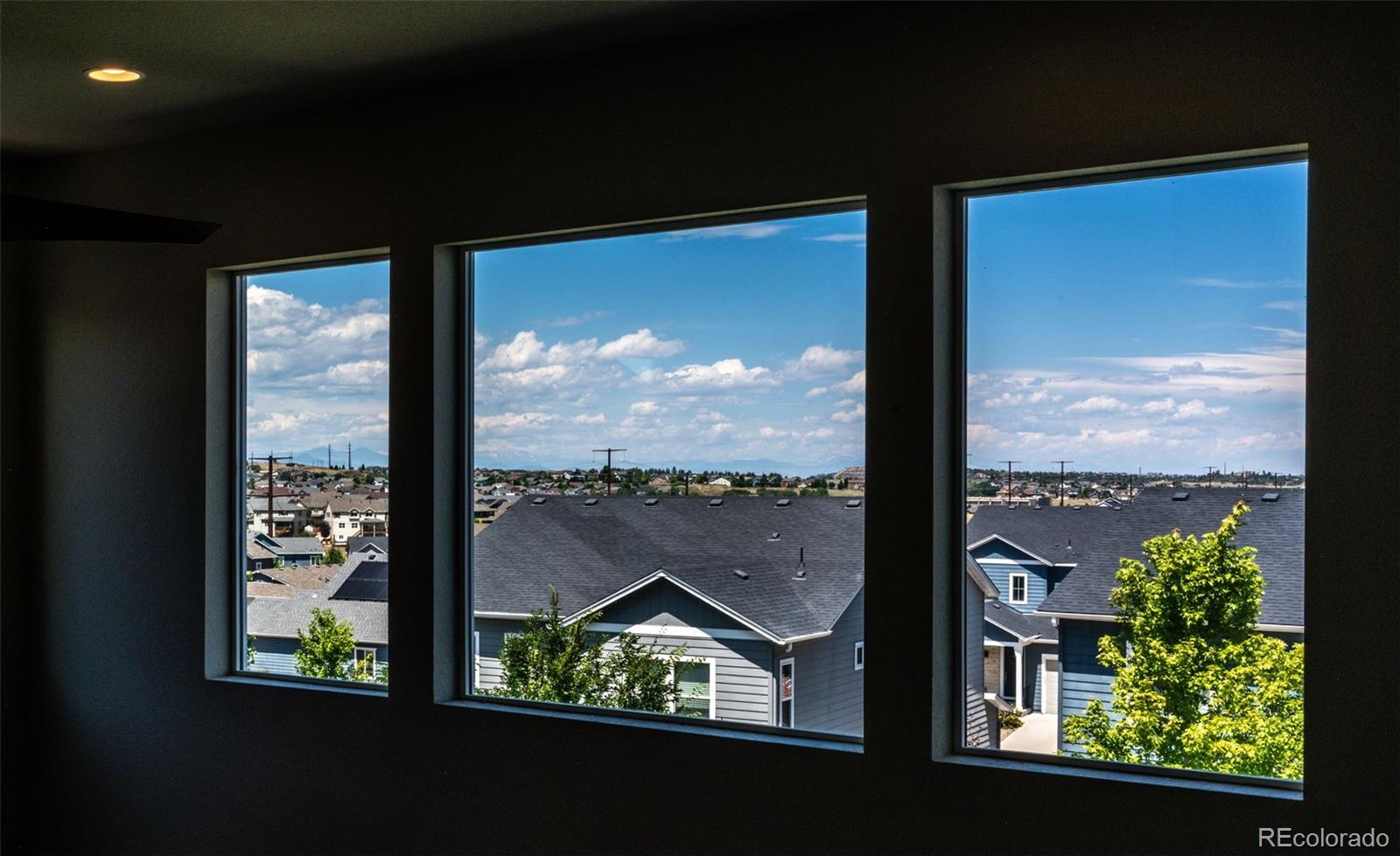 5086 Basalt Ridge Circle Castle Rock, CO 80108 - Photo 21 of 46 a view of swimming pool from a window