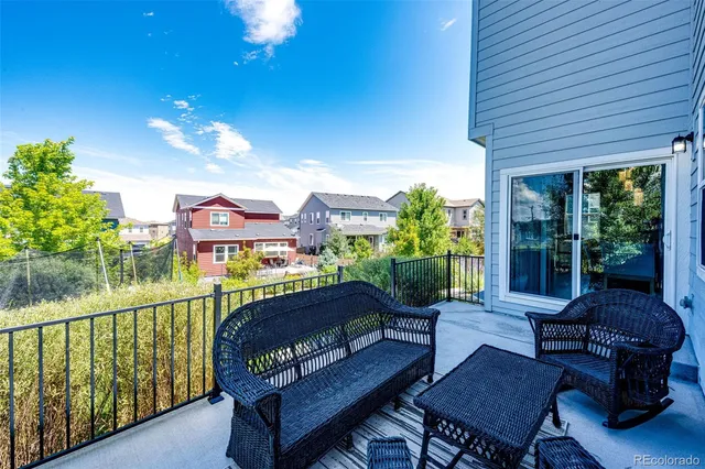 a outdoor living space with furniture and garden view