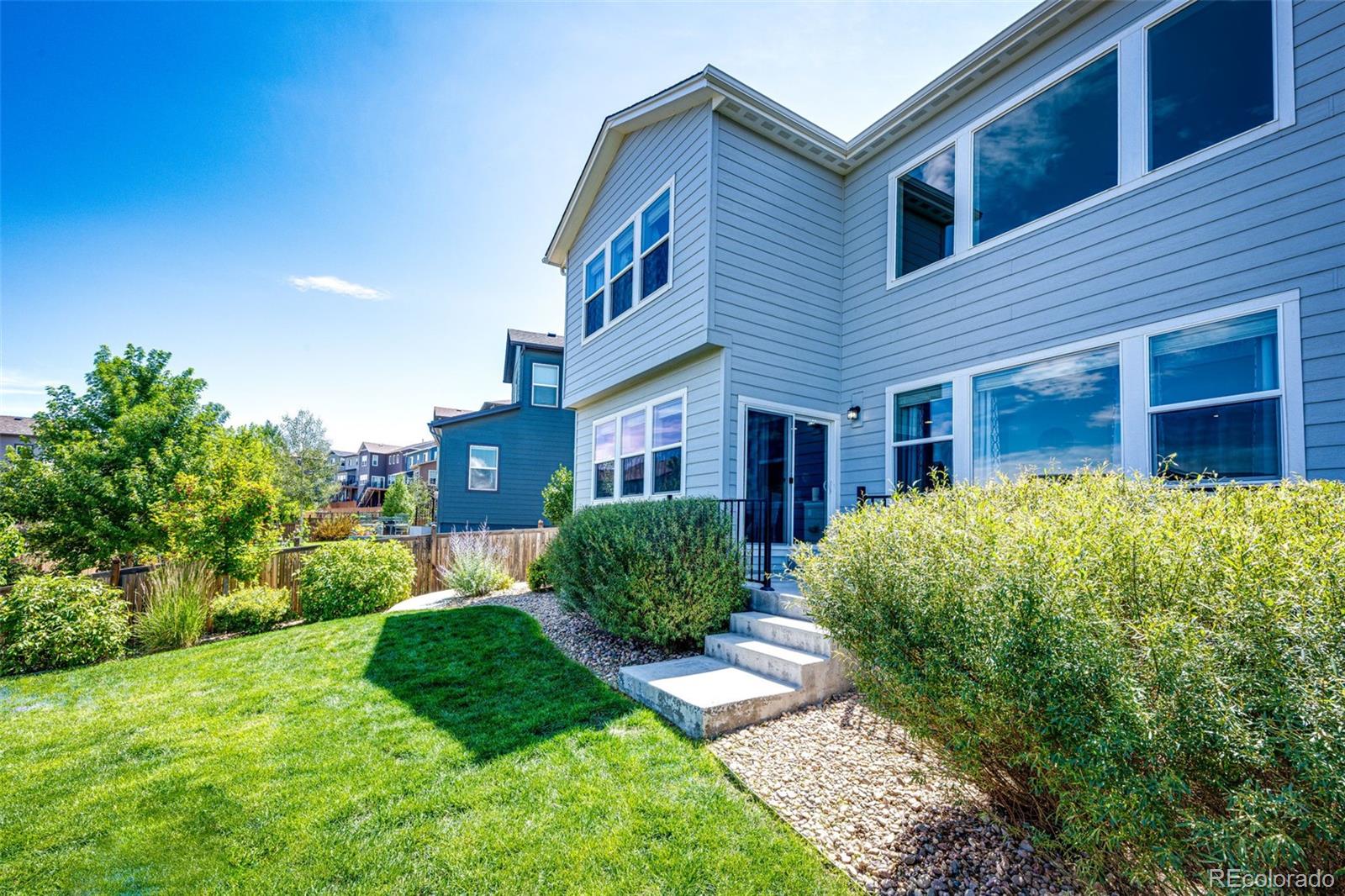 5086 Basalt Ridge Circle Castle Rock, CO 80108 - Photo 41 of 46 a house view with a garden space