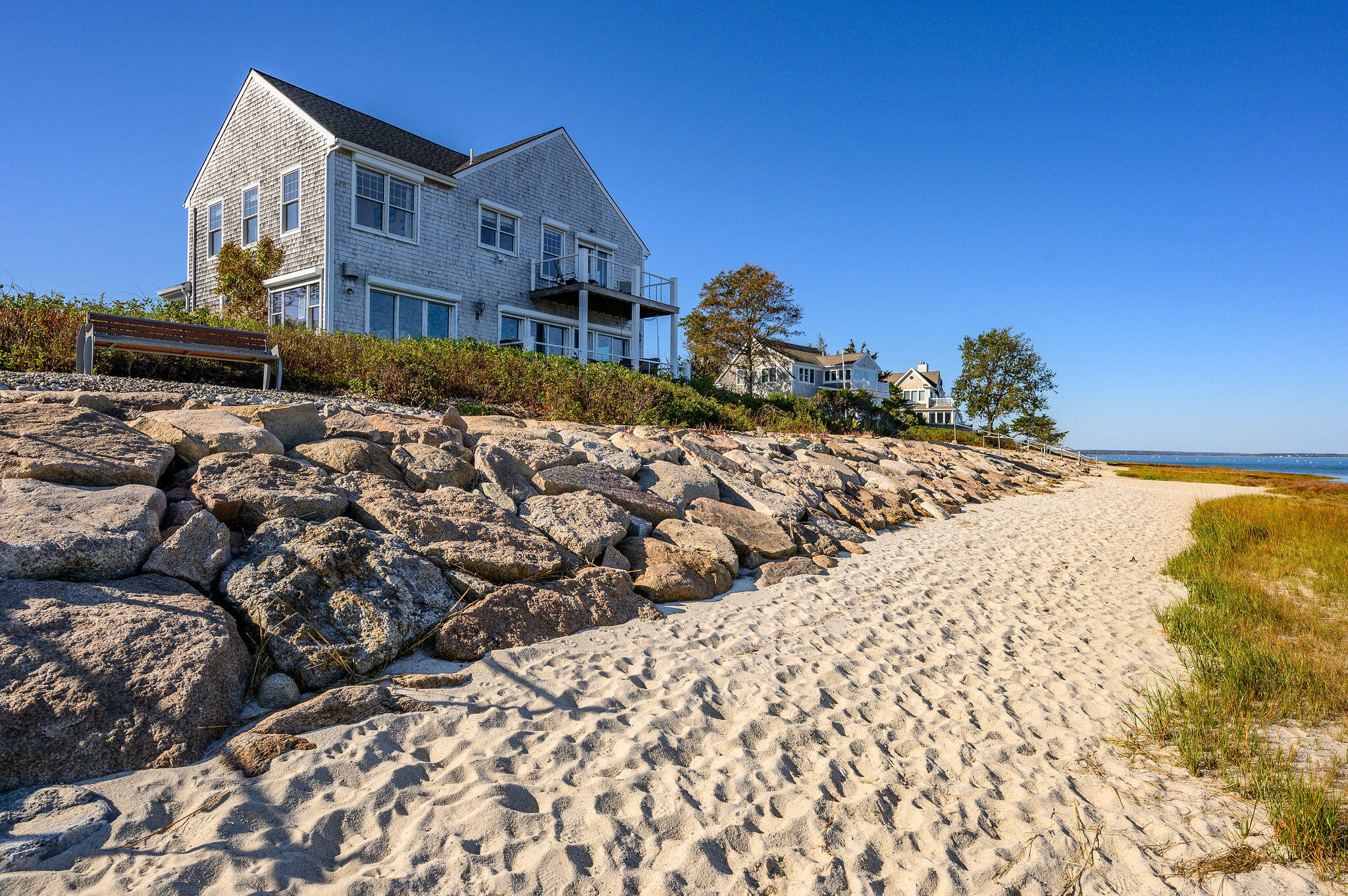 105 Harbor View Road Barnstable, MA 02630 - Photo 19 of 23 a view of a house with a snow on the road