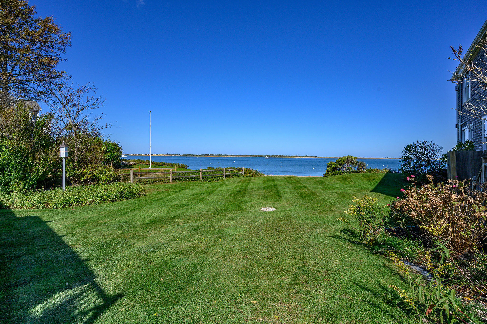 105 Harbor View Road Barnstable, MA 02630 - Photo 22 of 23 a view of a lush green space