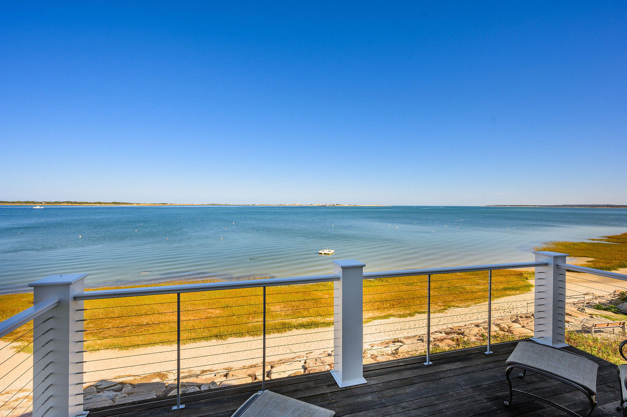 105 Harbor View Road Barnstable, MA 02630 - Photo 6 of 23 a view of ocean from a window