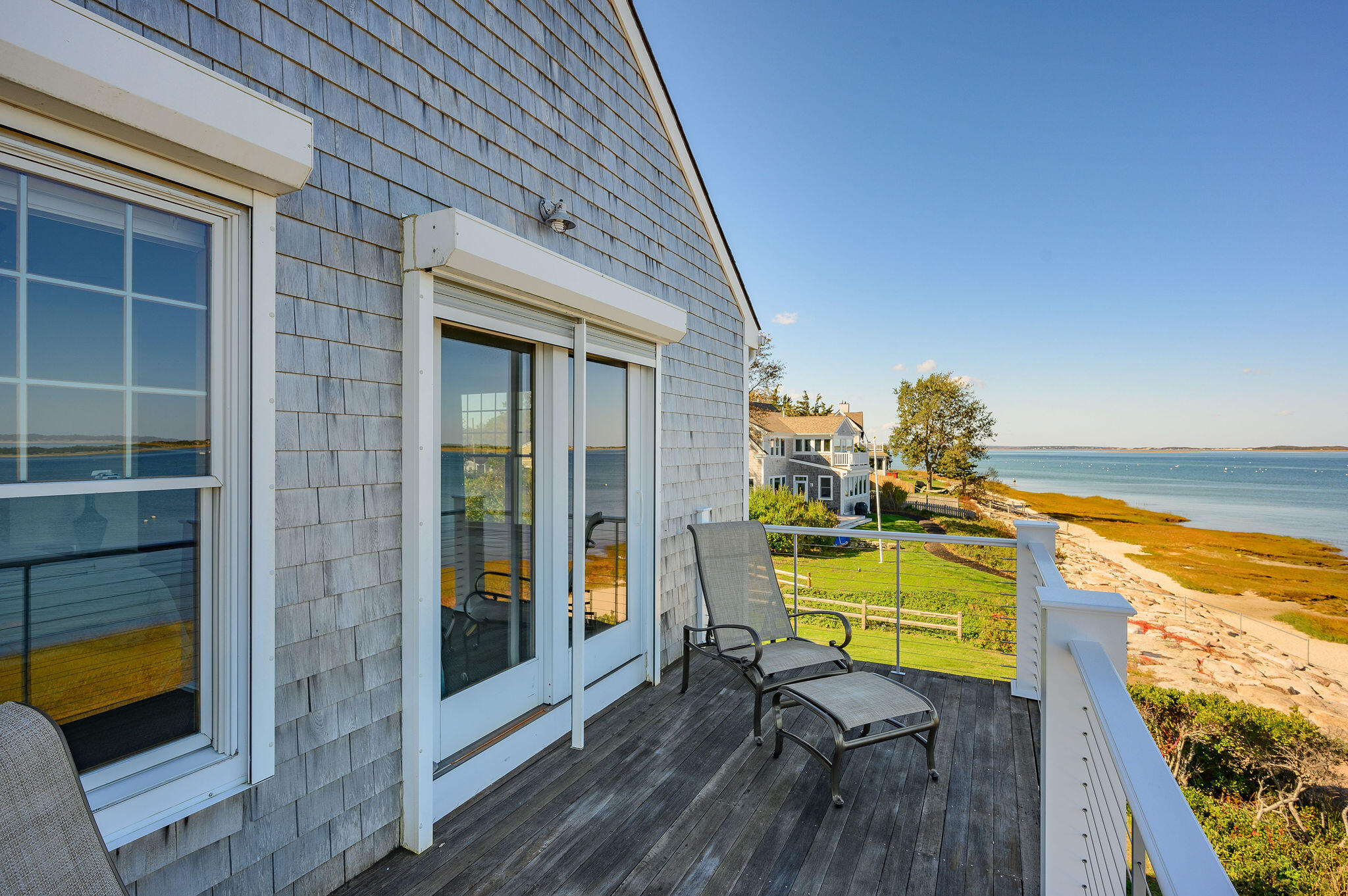 105 Harbor View Road Barnstable, MA 02630 - Photo 7 of 23 a view of a swimming pool with lounge chair