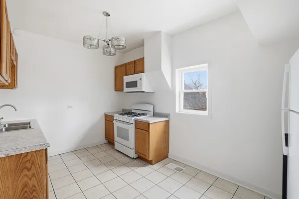 $560,000 | 8705 South Saginaw Avenue, Chicago, IL 60617