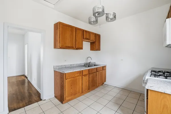 $560,000 | 8705 South Saginaw Avenue, Chicago, IL 60617
