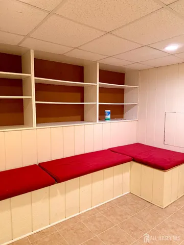 a view of a bedroom with a bed and closet