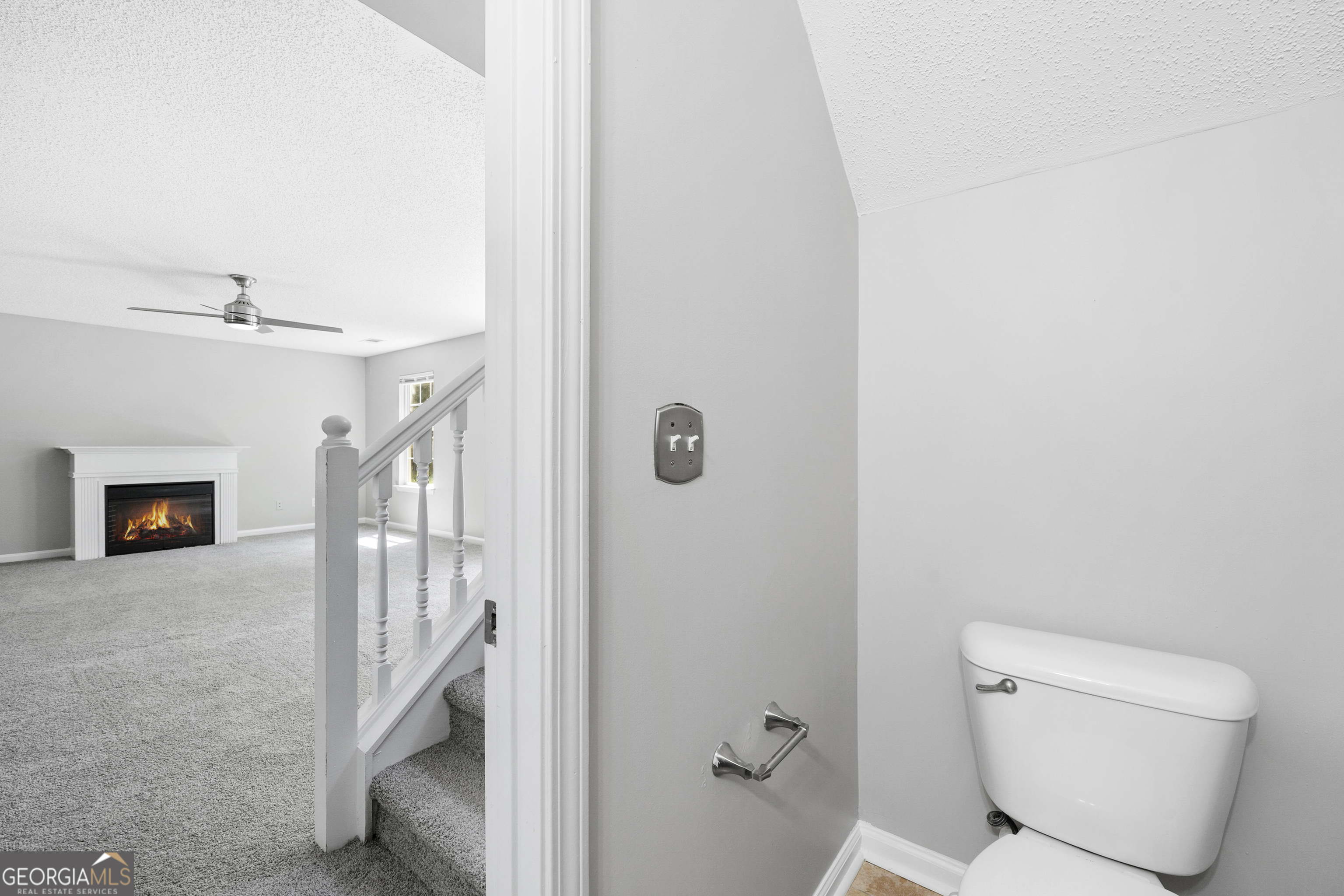 1883 Simmons Lane Hampton, GA 30228 - Photo 12 of 28 a bathroom with a toilet and a shower