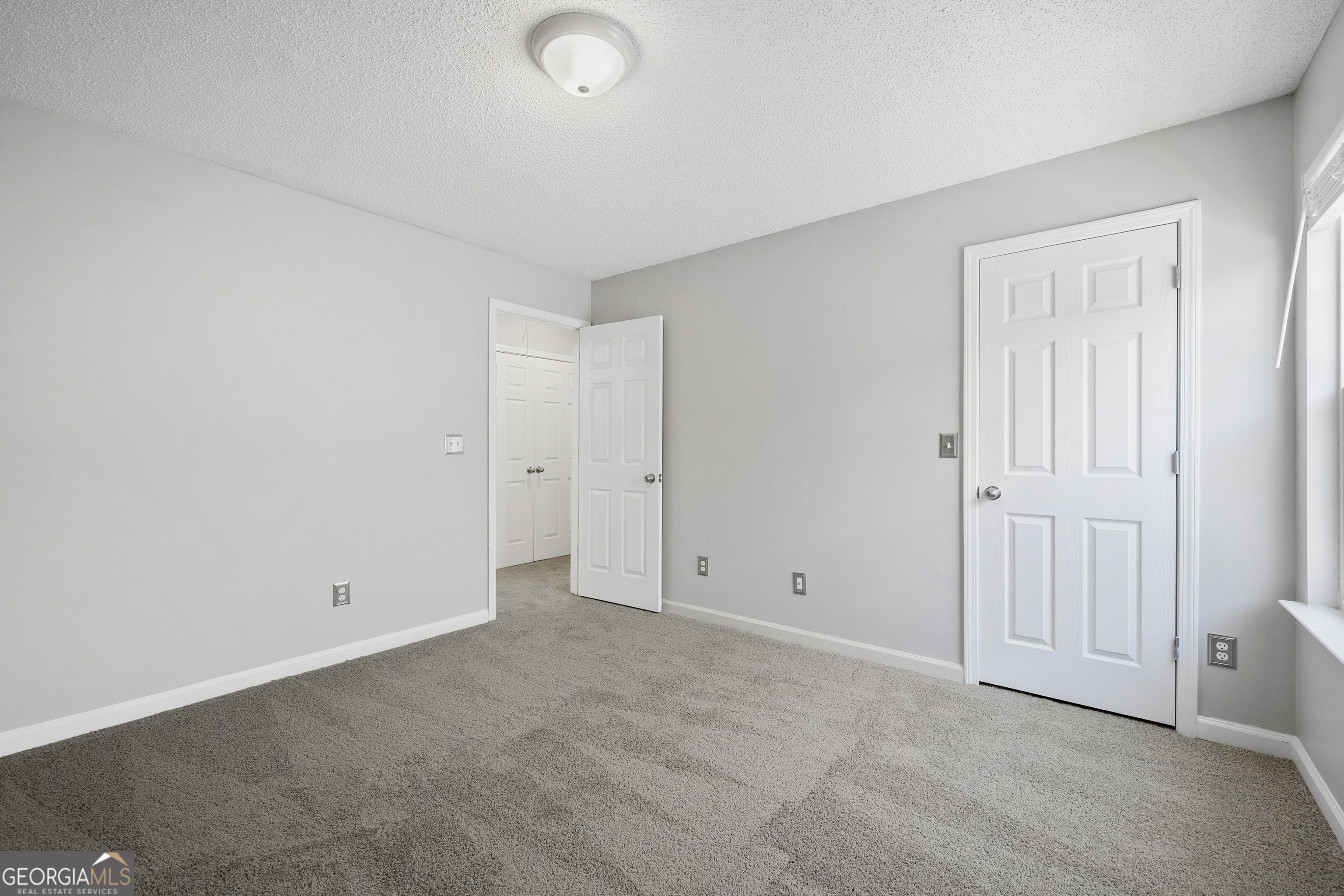 1883 Simmons Lane Hampton, GA 30228 - Photo 21 of 28 an empty room with an entryway