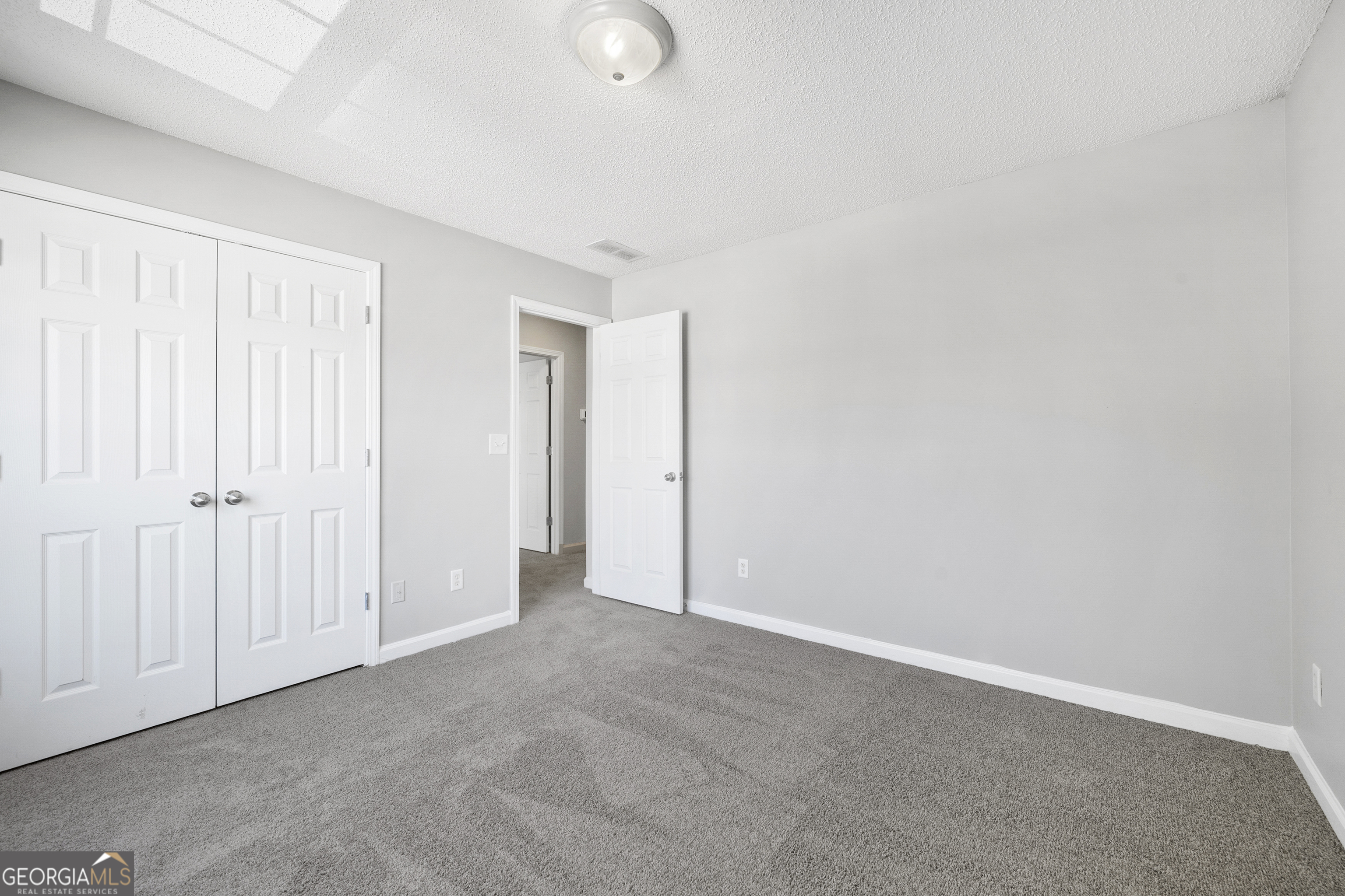 1883 Simmons Lane Hampton, GA 30228 - Photo 26 of 28 a view of an empty room
